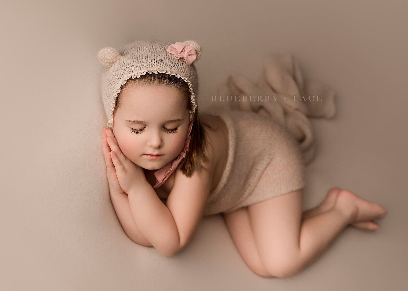 My daughter at age 5 posed as a little newborn. How does flies by so fast. Blueberry and Lace Photography Oswego New York