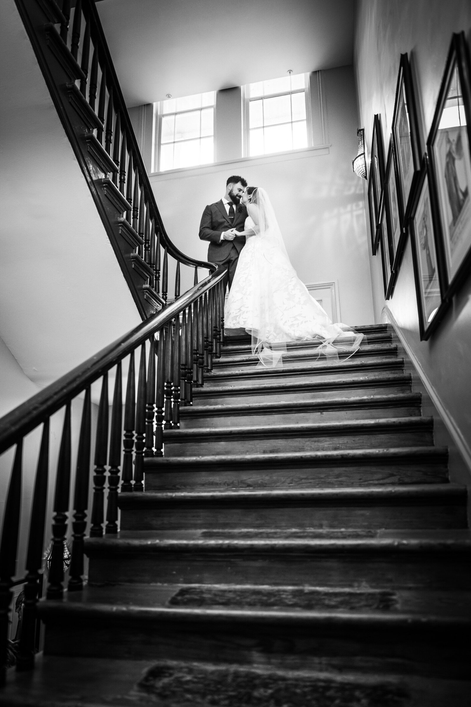Bride and groom on stairway at Hotel St. Vincent
