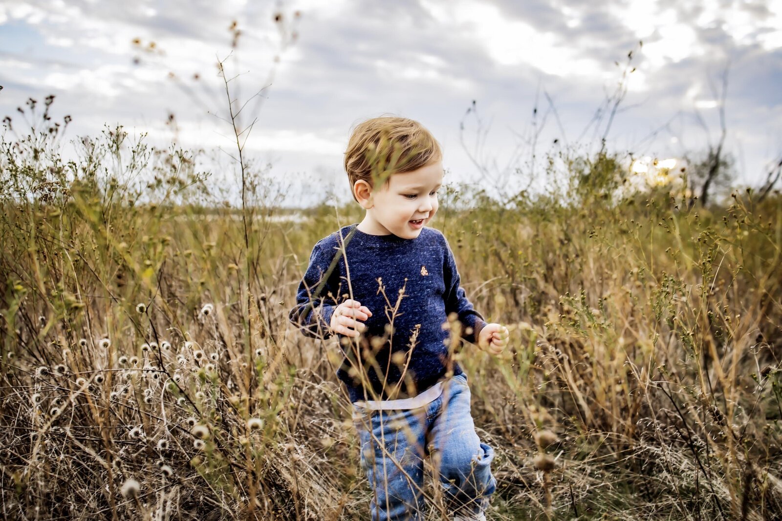 a young boy beside Lake Lewisville