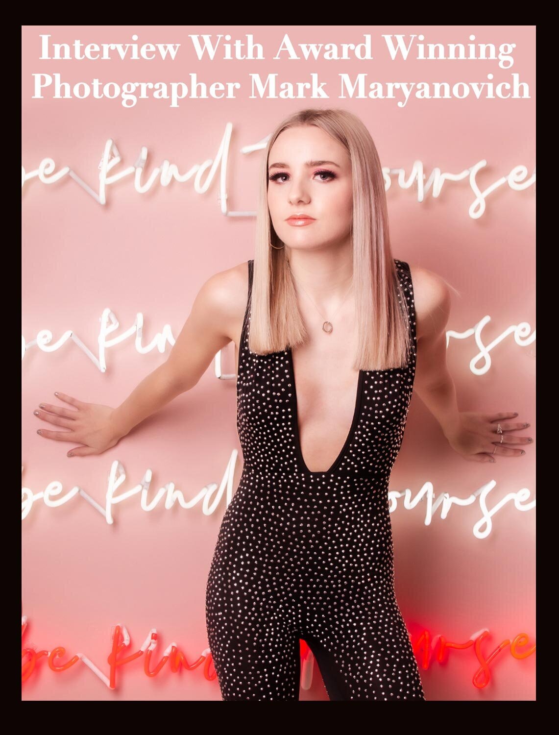 Interview featuring LA photographer Mark Maryanovich Pump It Up Magazine female musician standing against with hands behind her pink wall  with words in neon lights behind her page 1
