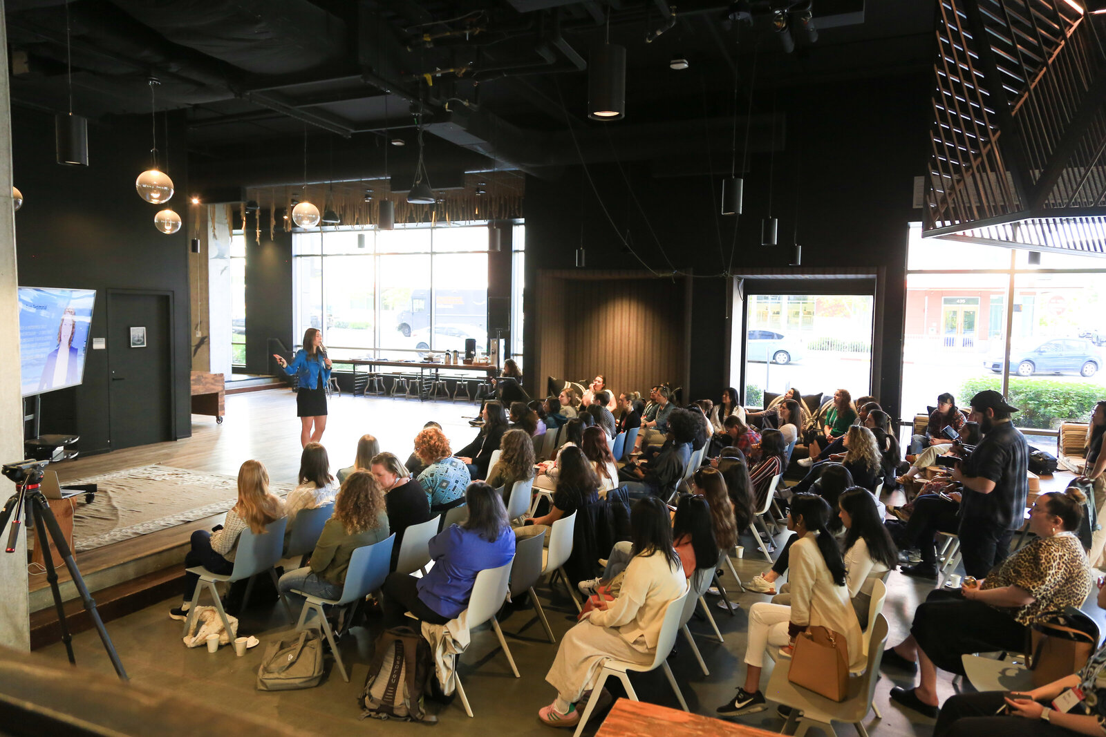 Dr. Joan Palmiter Bajorek leading a live AI workshop with a team
