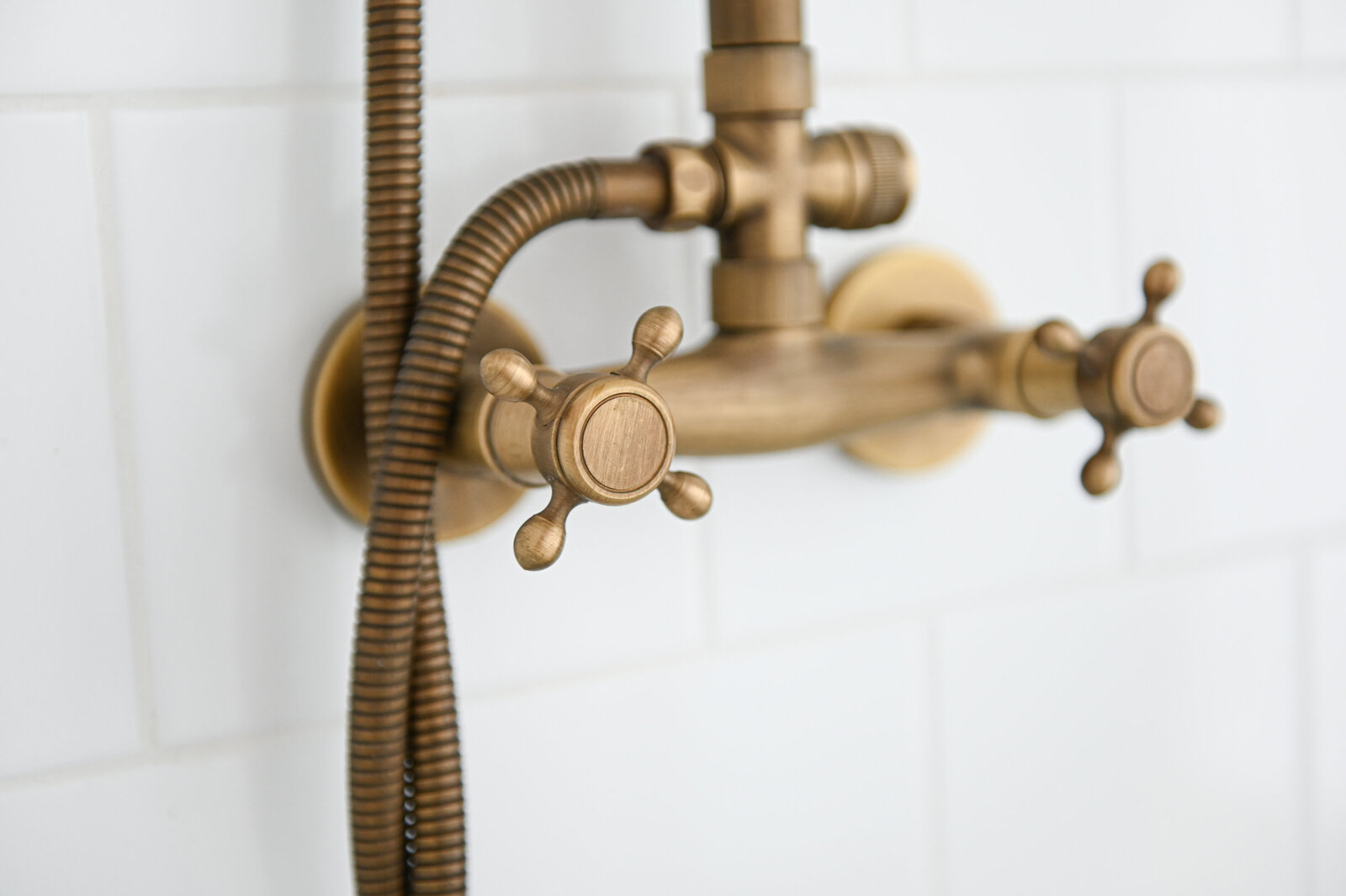 Rebecca Foster Interior Designer  bathroom shower faucet gold north vanouver white tile
