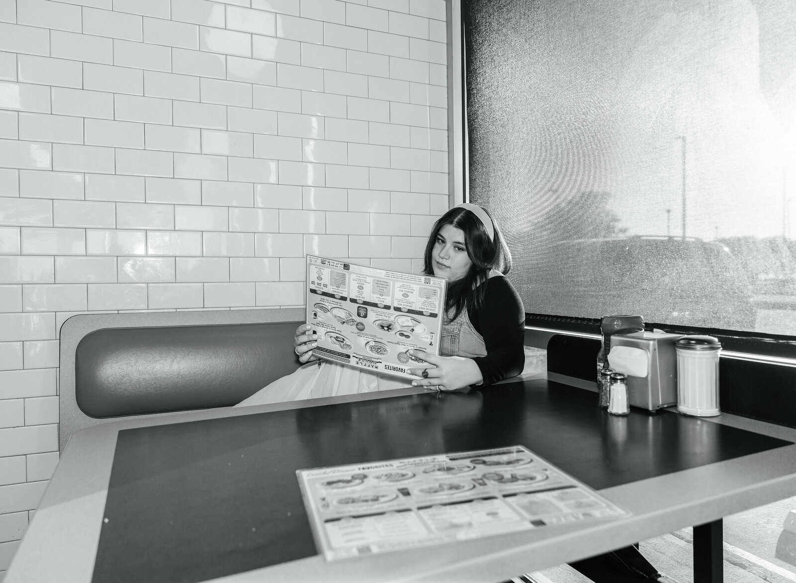 girl looking at menu