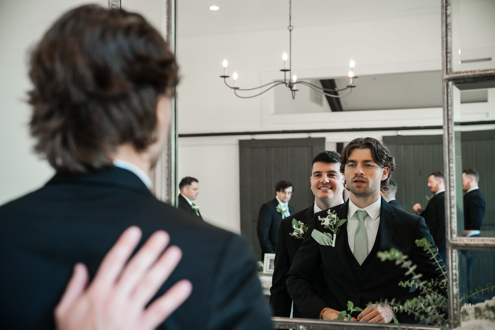 Groom is getting ready at the wedding venue at Daisy Hill with support of his best man at the wedding venue at Daisy Hill