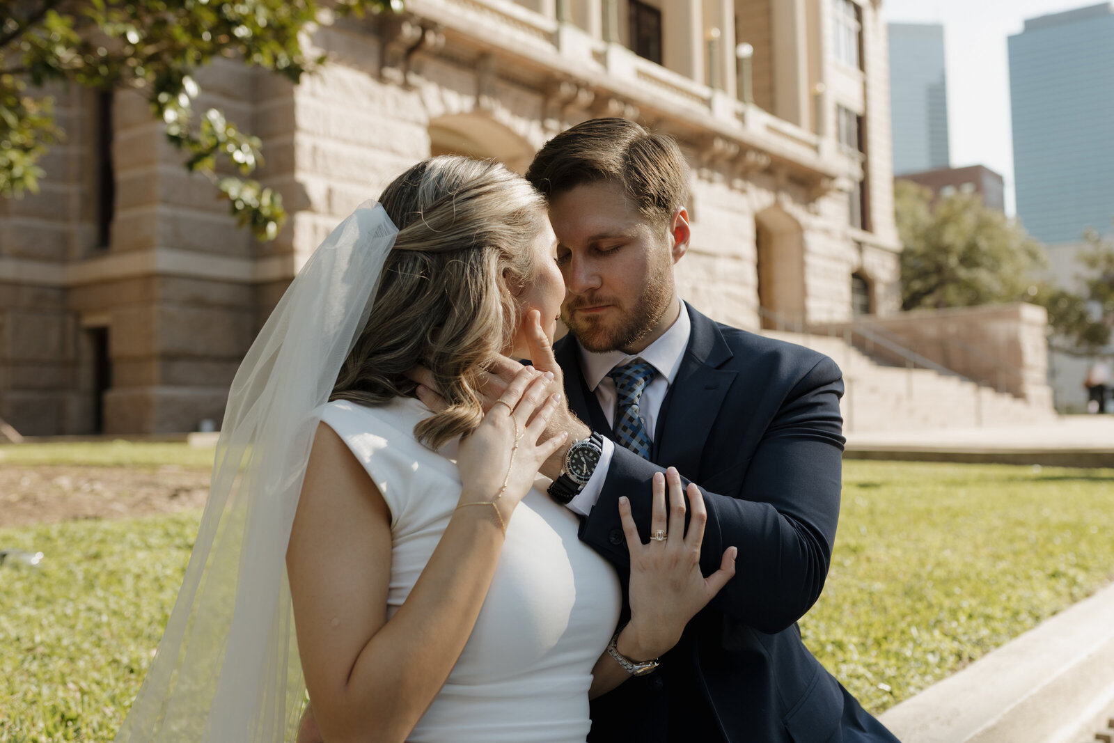 man and women outside of 1910 courthouse in houston, TX