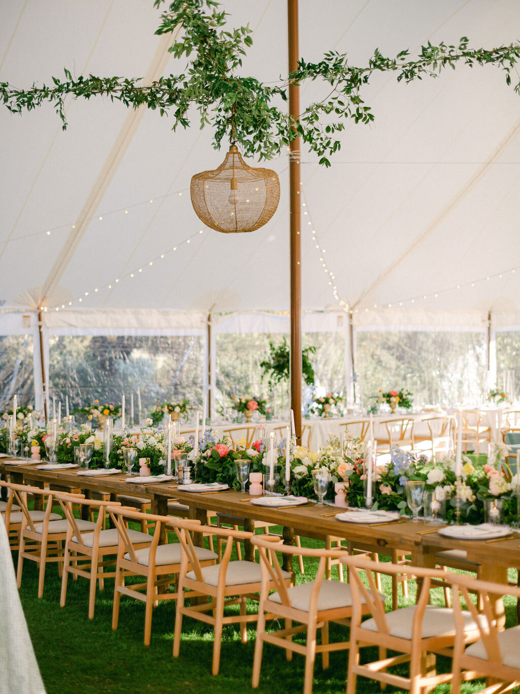 tented wedding reception on the lawn at gulf green at Alys beach