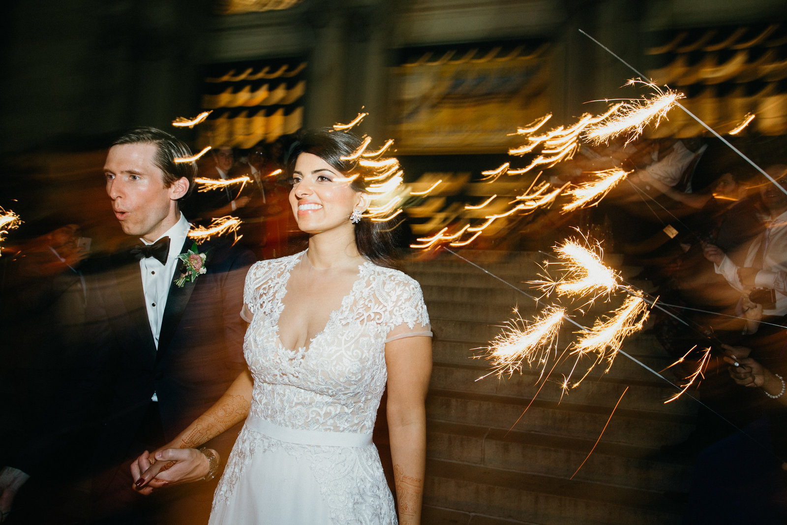 Bride and groom photographed leaving their Philadelphia Museum wedding with a sparkler exit!