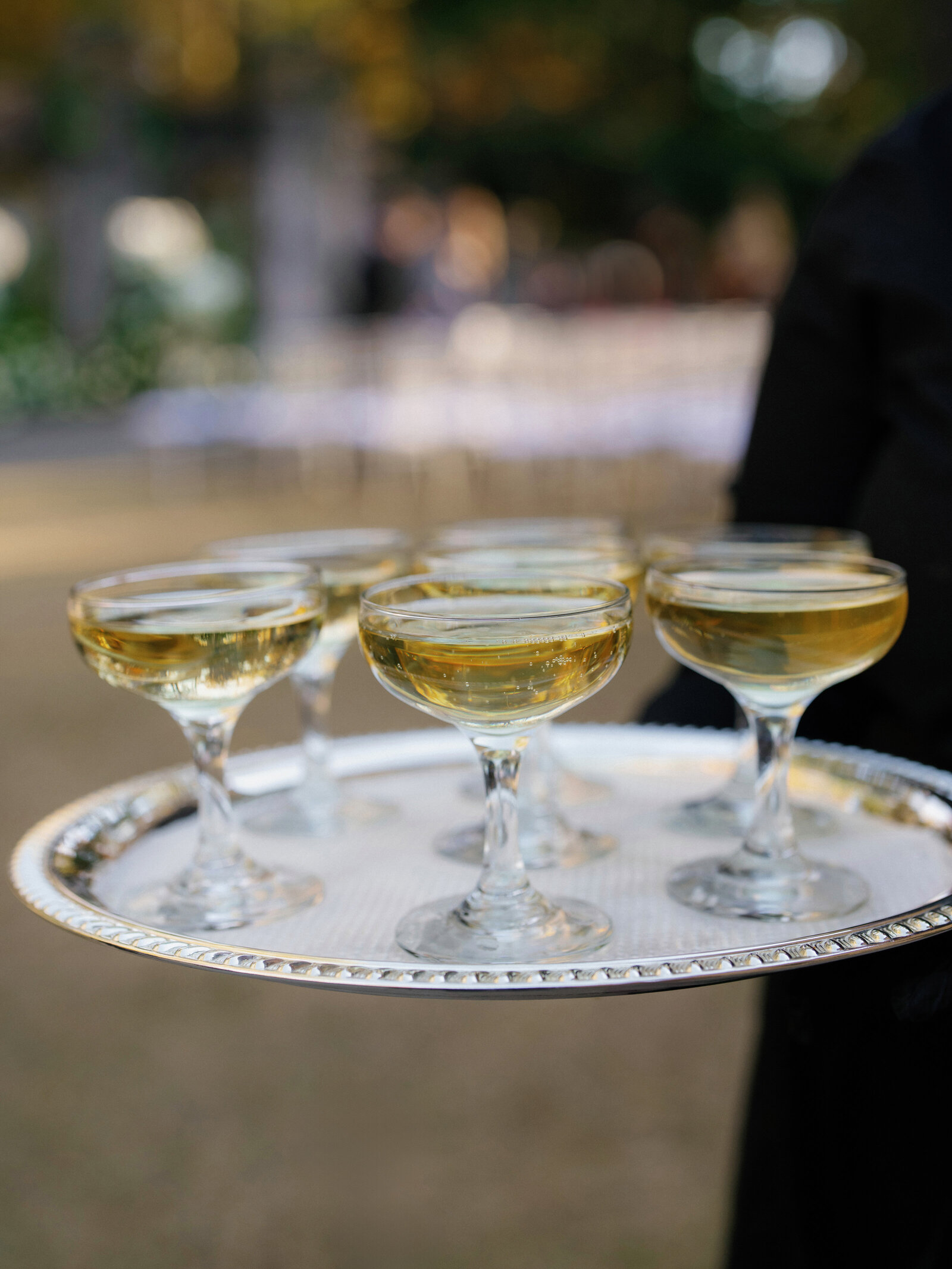 Pre-wedding ceremony cocktails setup with elegant glassware and décor