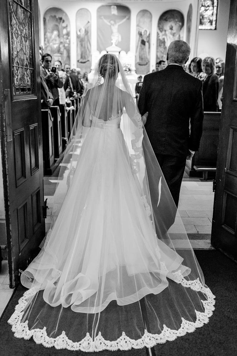 Father walks bride down the aisle, St Mary's Church, Charleston, South Carolina. Kate Timbers Photography.