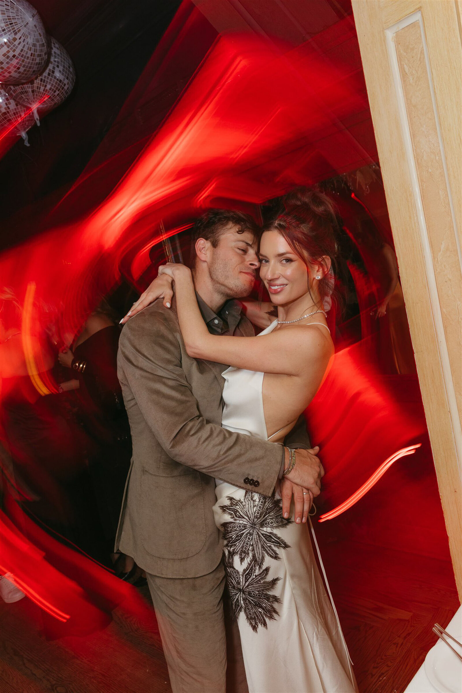 Stylish bride and groom at multi-day Aspen wedding with upscale decor and alpine scenery