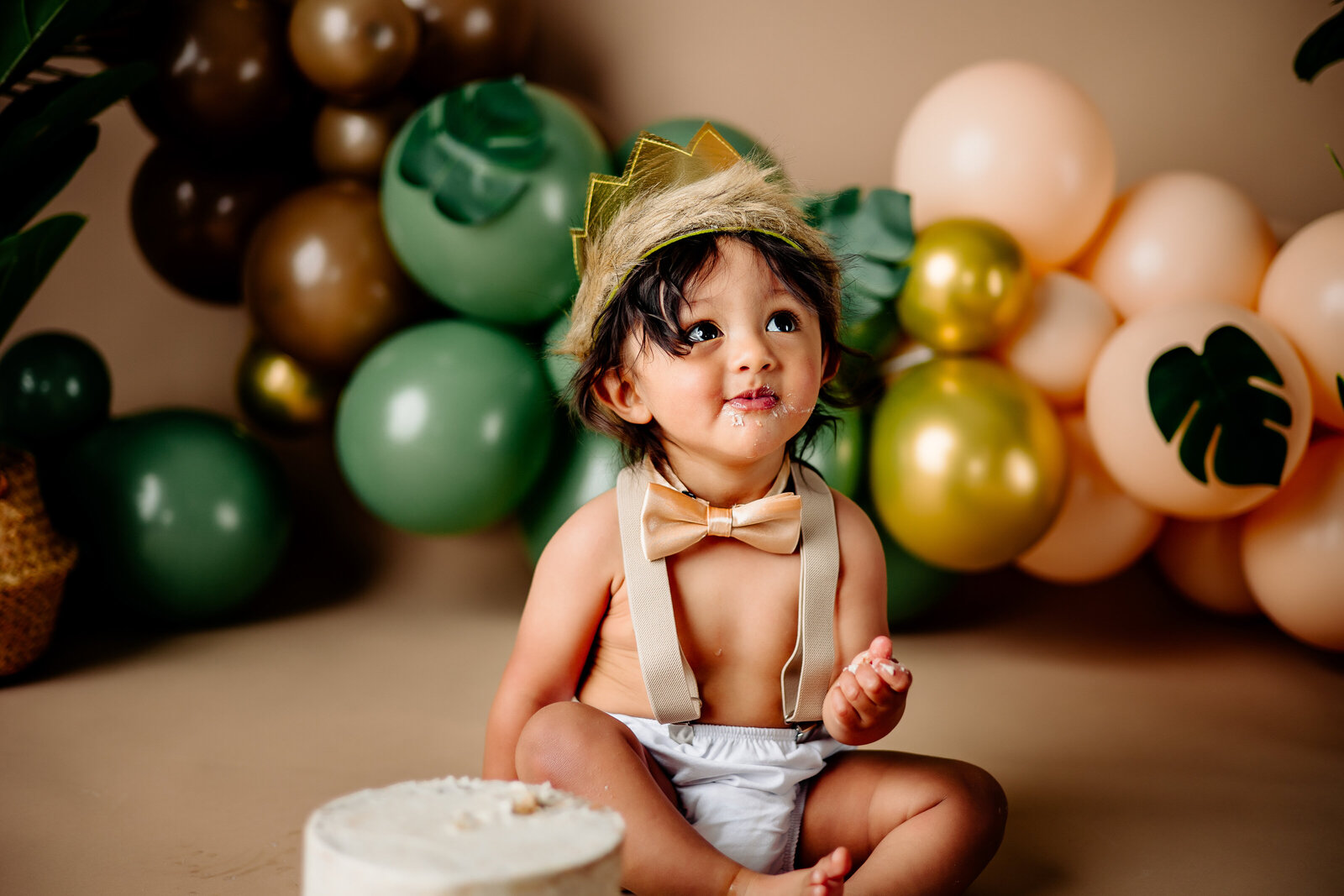 A baby's first taste of cake is captured in this heartwarming cake smash