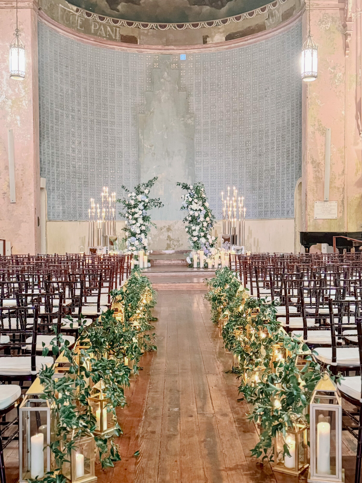 luxury ceremony design with florals and candles