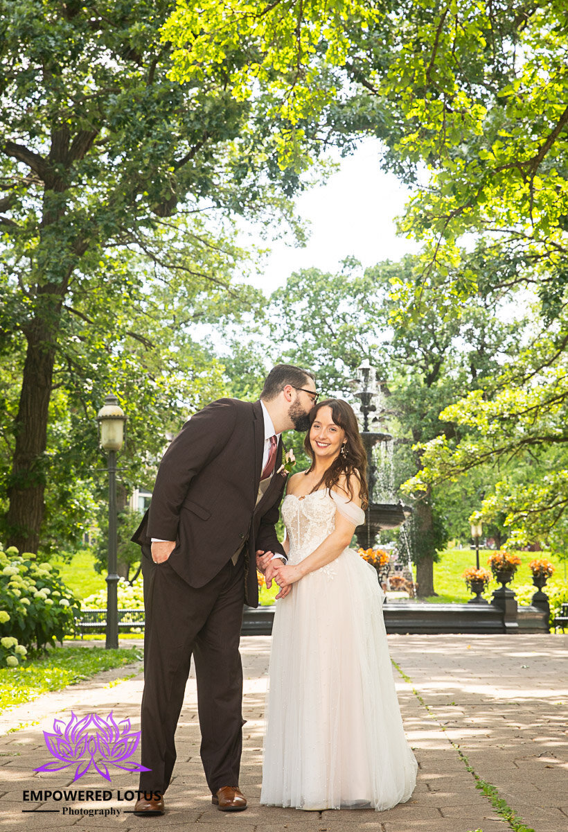 Bride Groom in park with fountain-2