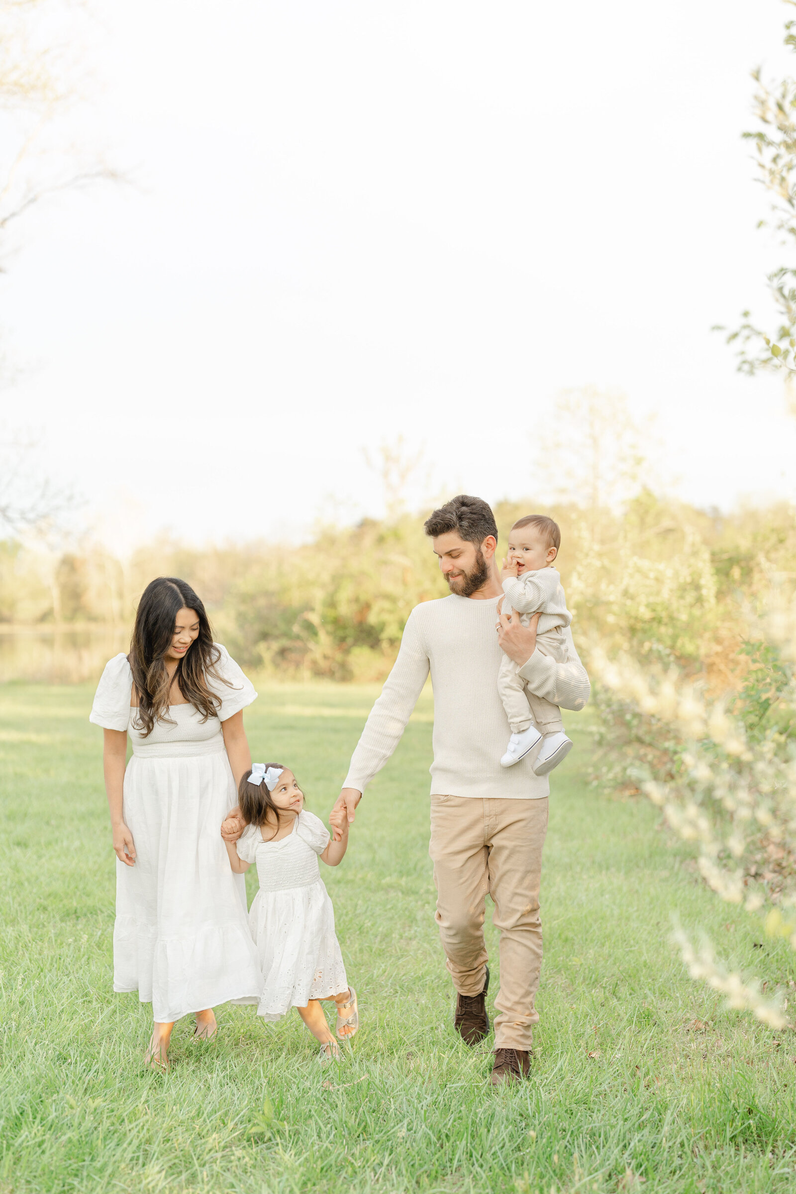 family walking during Ashburn, Virginia spring minis