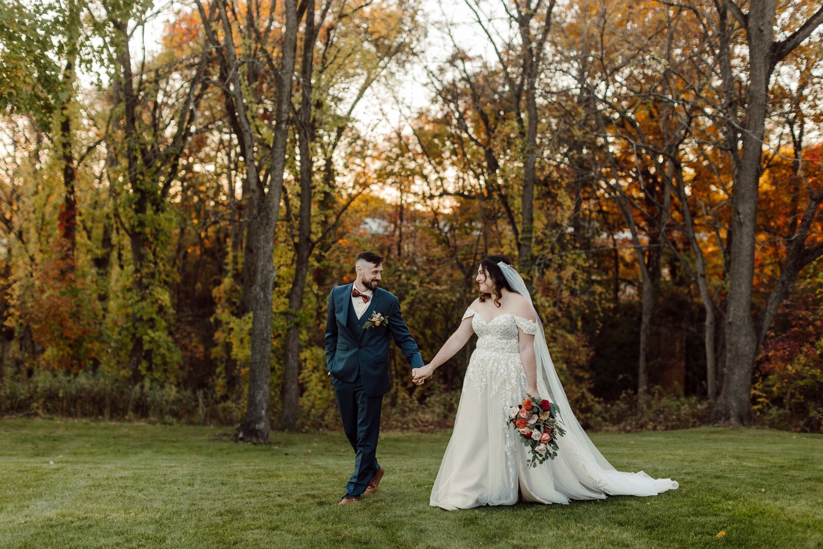 Albany Wedding Photographer capturing wedding couple holding hands