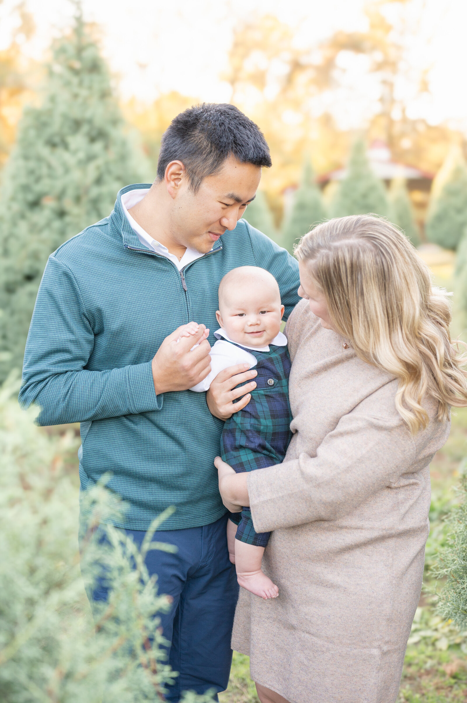 Family with baby at tree farm Raleigh Family Photographer