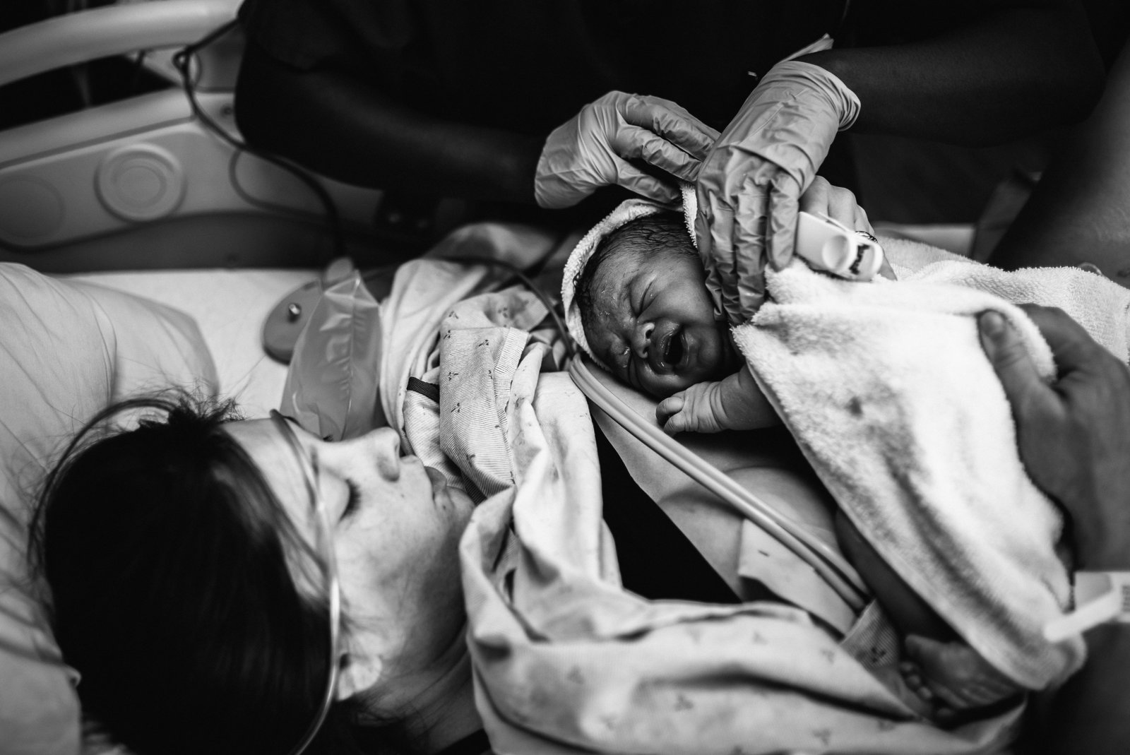 mom holds baby for the first time following hospital birth in St. Pete