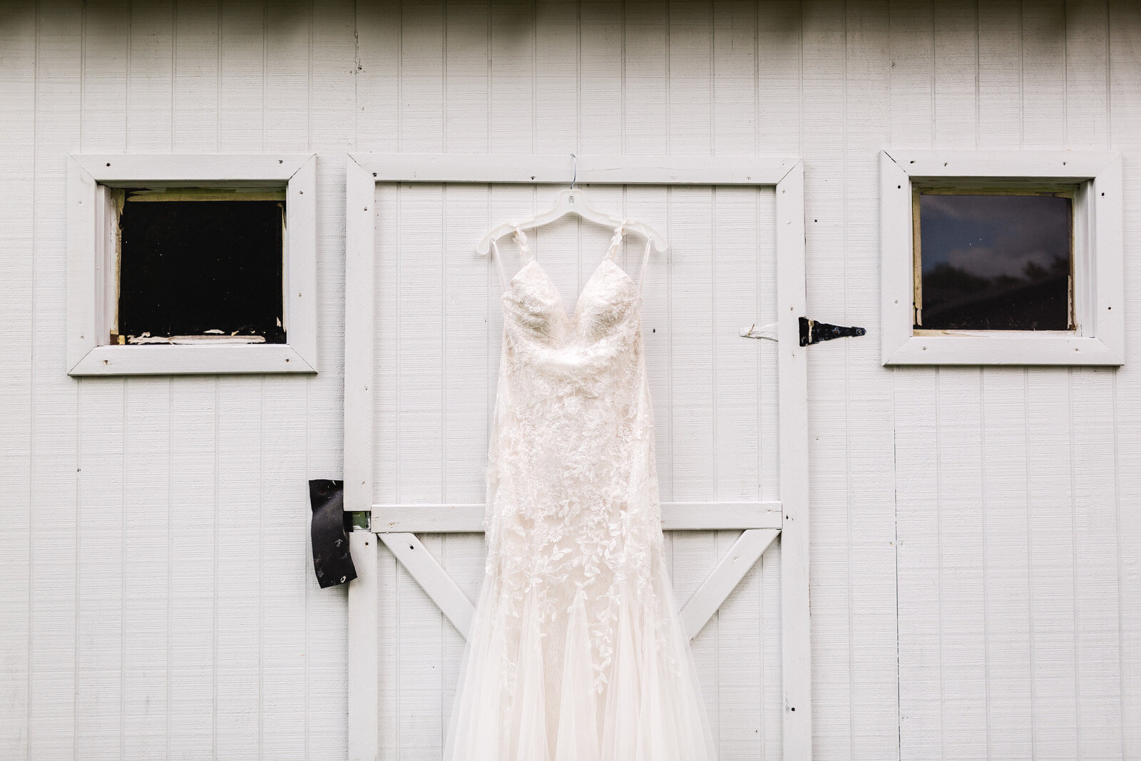 wedding dress hanging on barn ohio