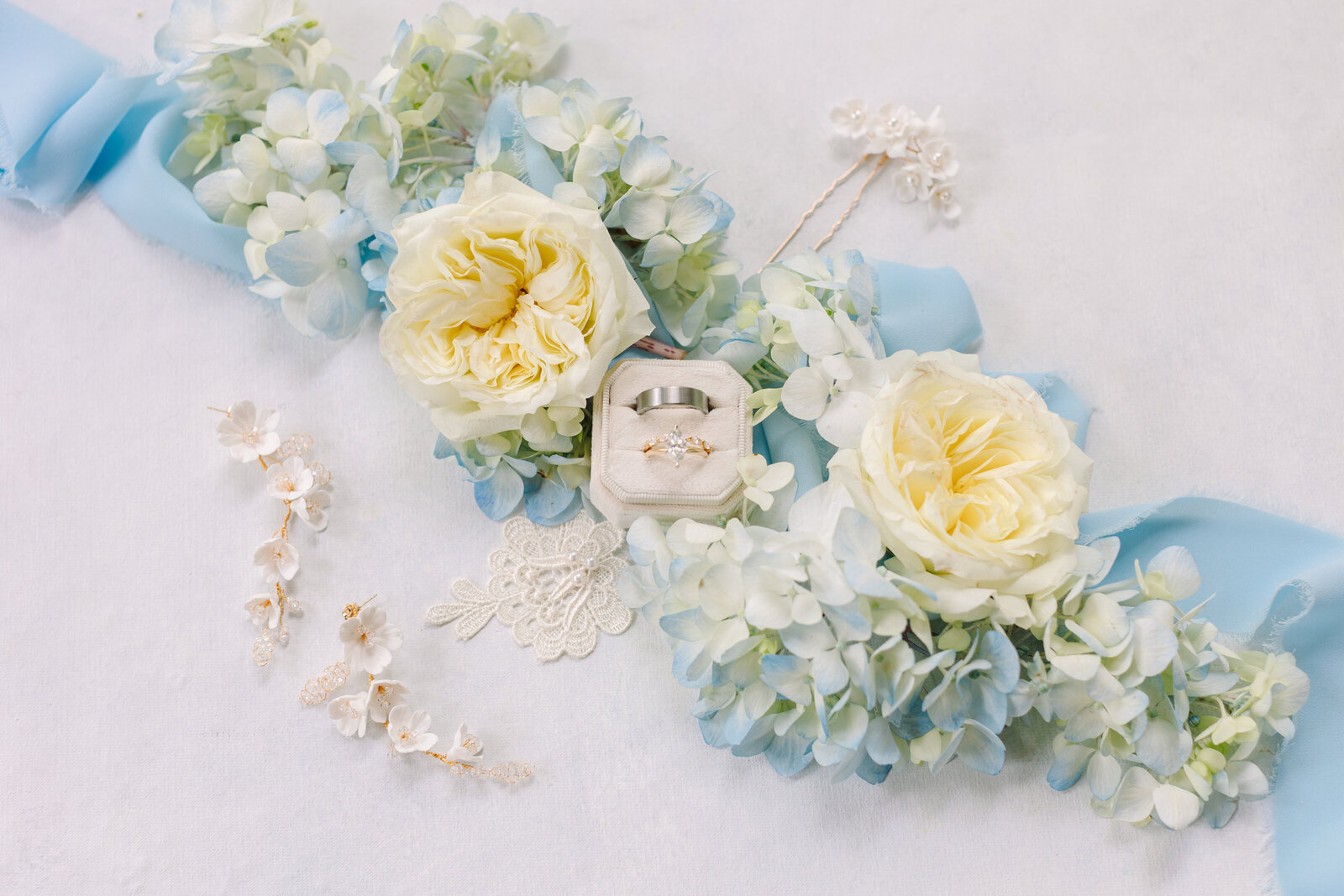 Shades of blue and white bridal details with soft flowers