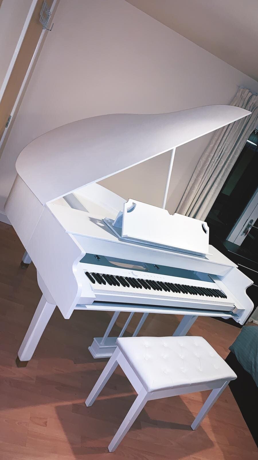 white baby grand piano shell