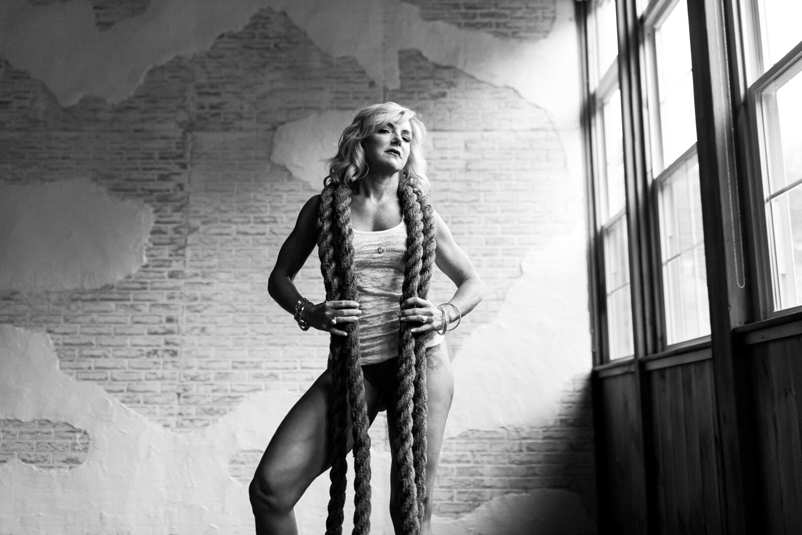 black and white photo of a woman with her training rope 