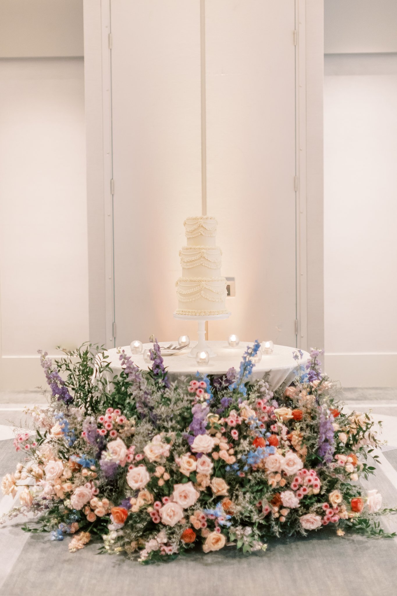 flowers-scottsdale-az-cake-table-ground-floral-pink-purple