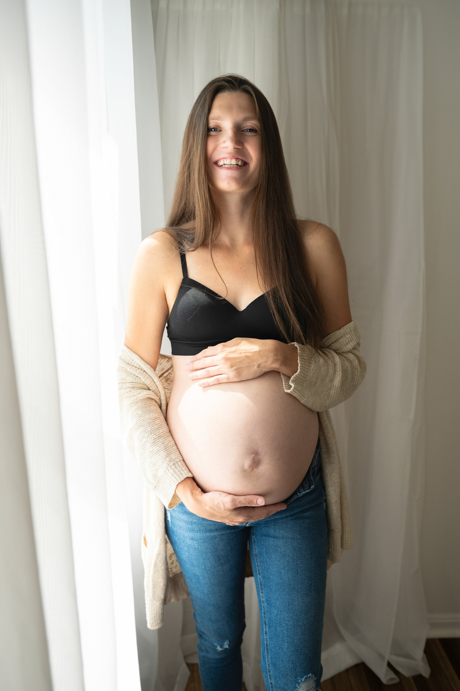 woman with her pregnant belly