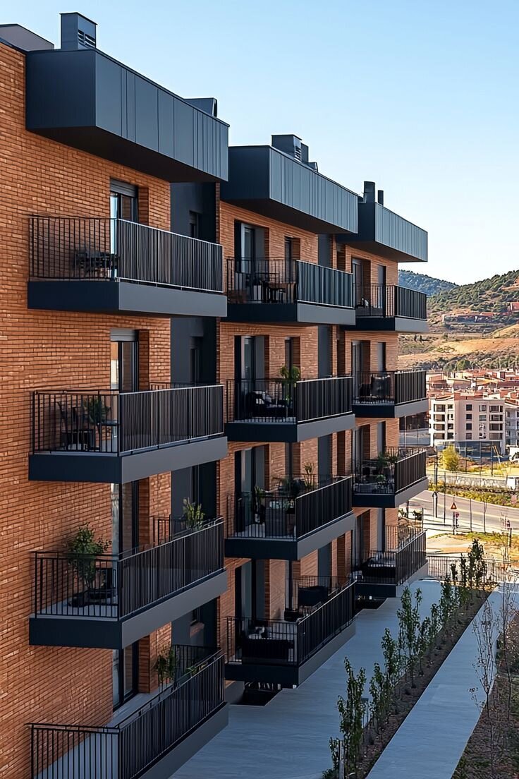 Sustainable Elegance_ Brick & Metal Apartments Amidst Majestic Mountain Views