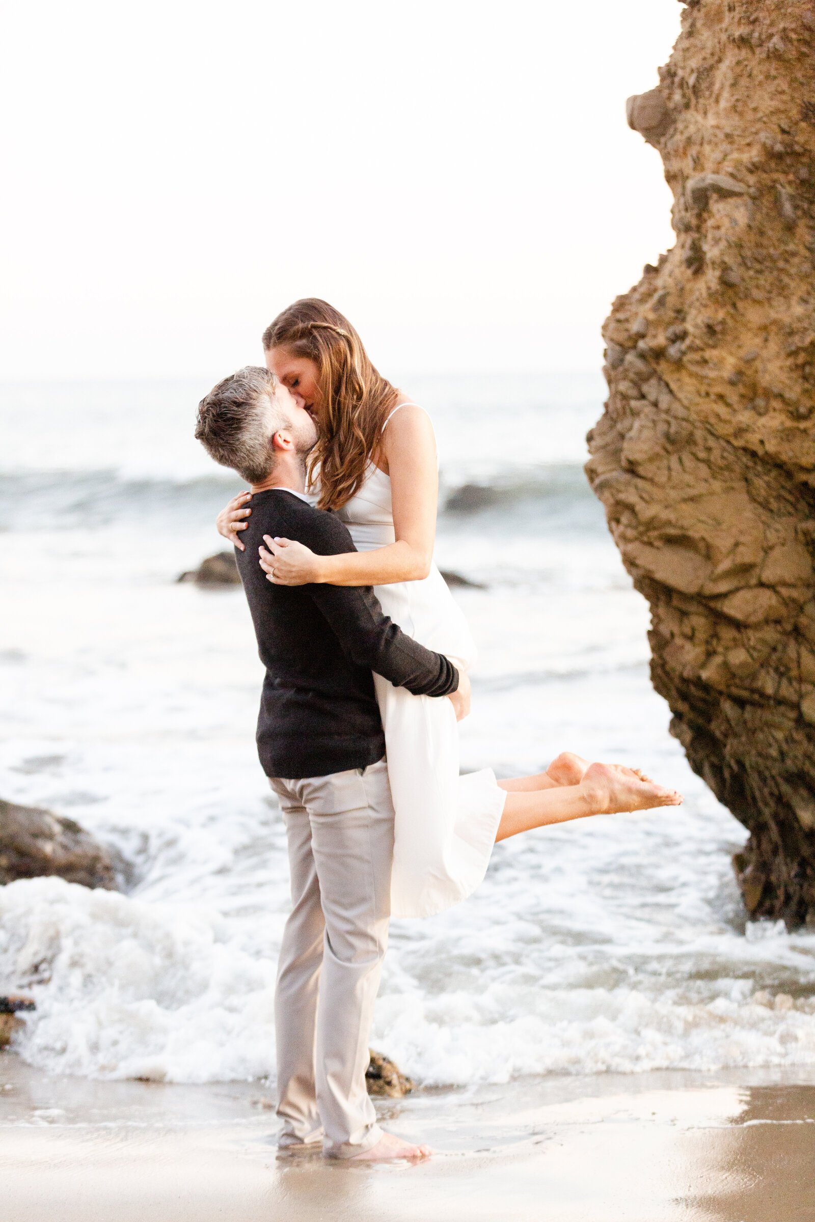 Destination engagement session taken by husband and wife wedding photographers