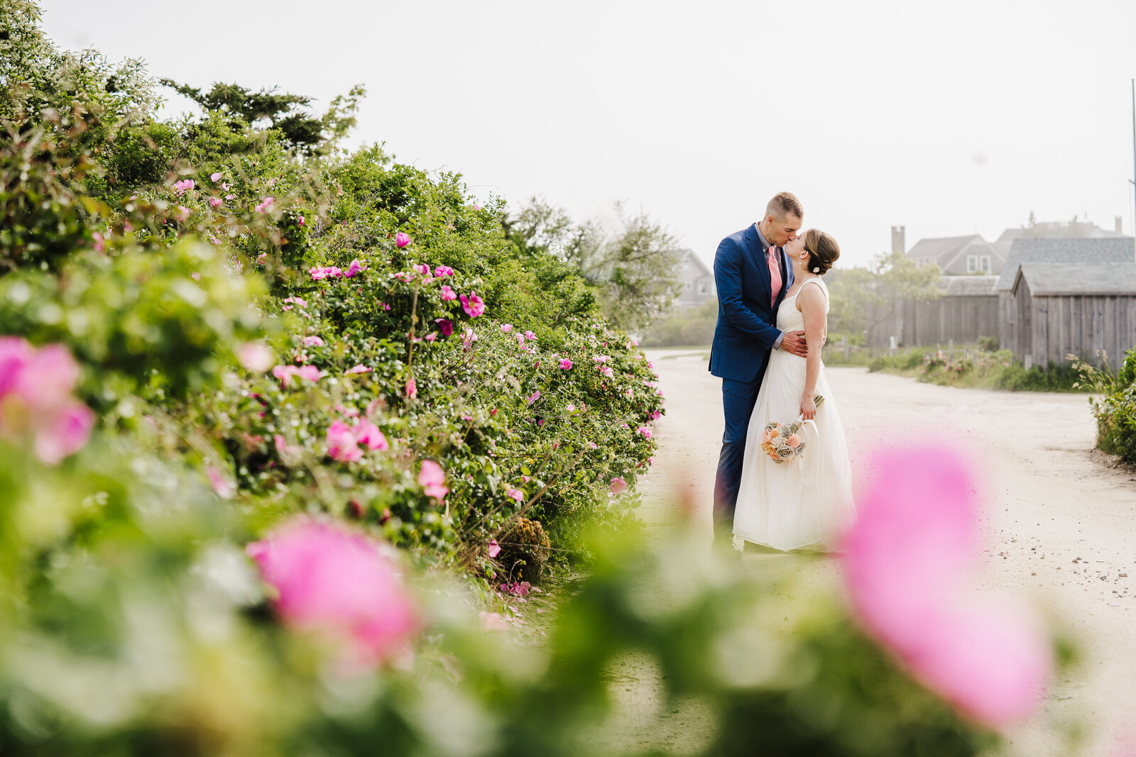 cape cod elopement with pink desert roses