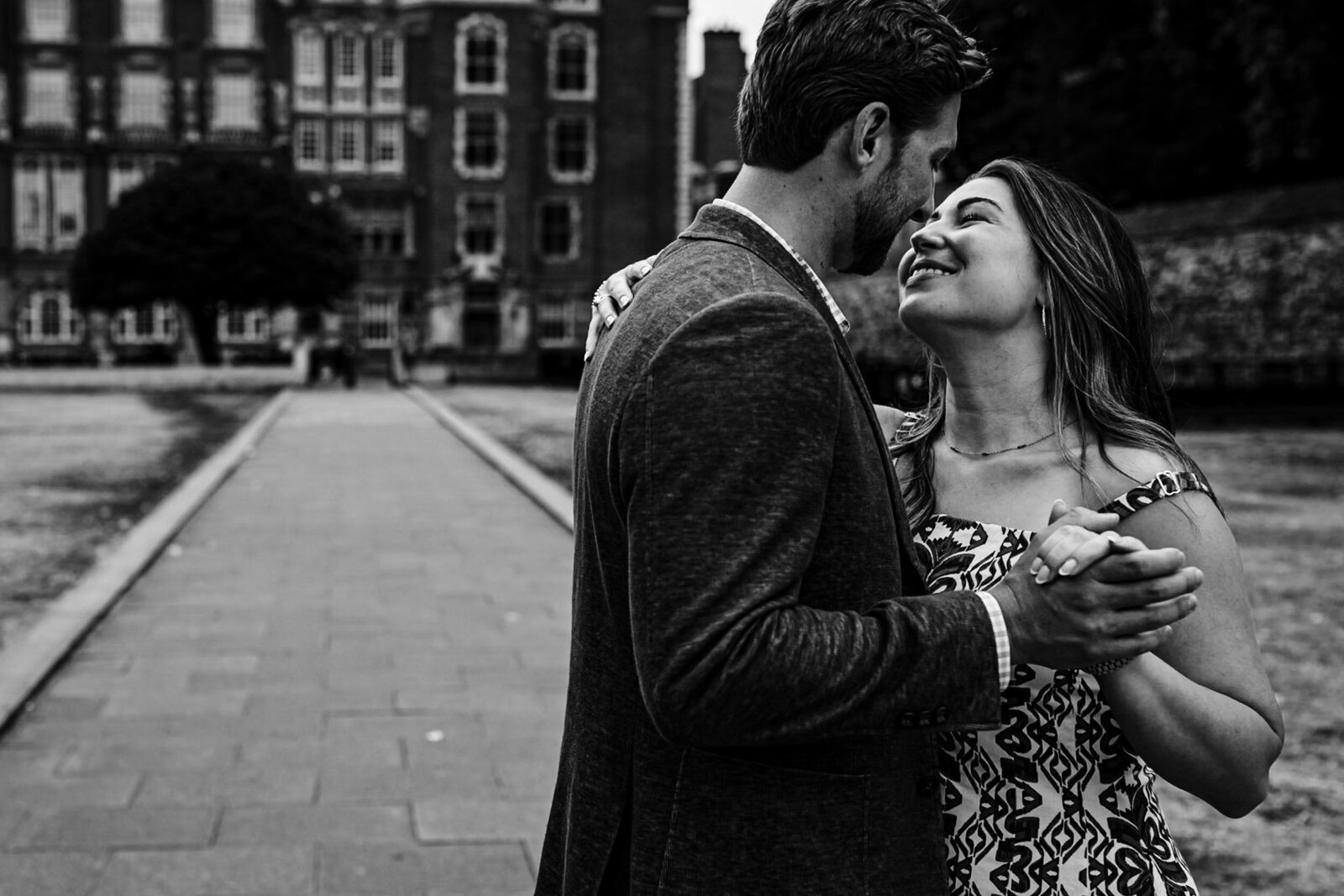 Couple about to kiss in Westminster during their engagement photoshoot.