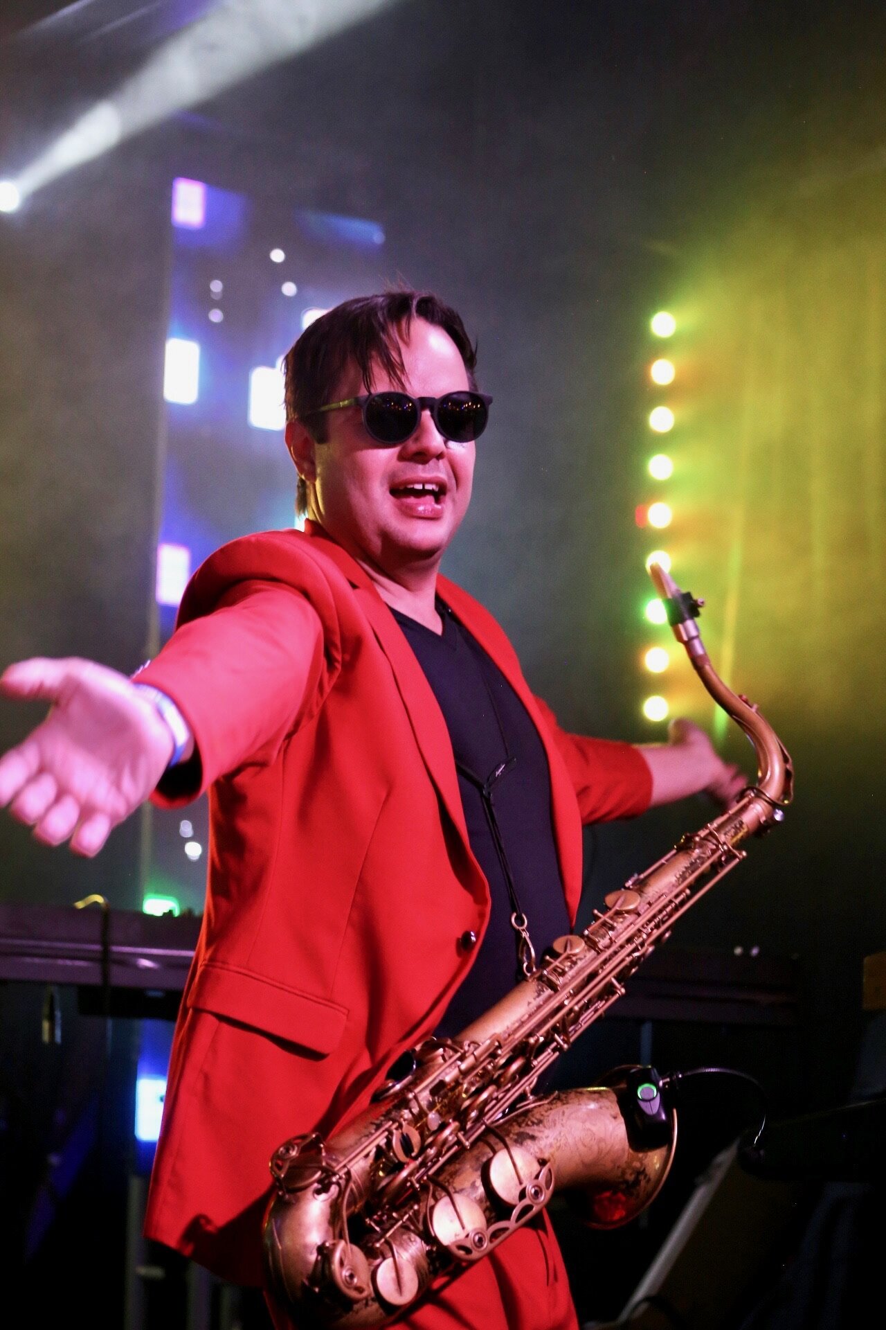 Stephen Saxy Herring red suit