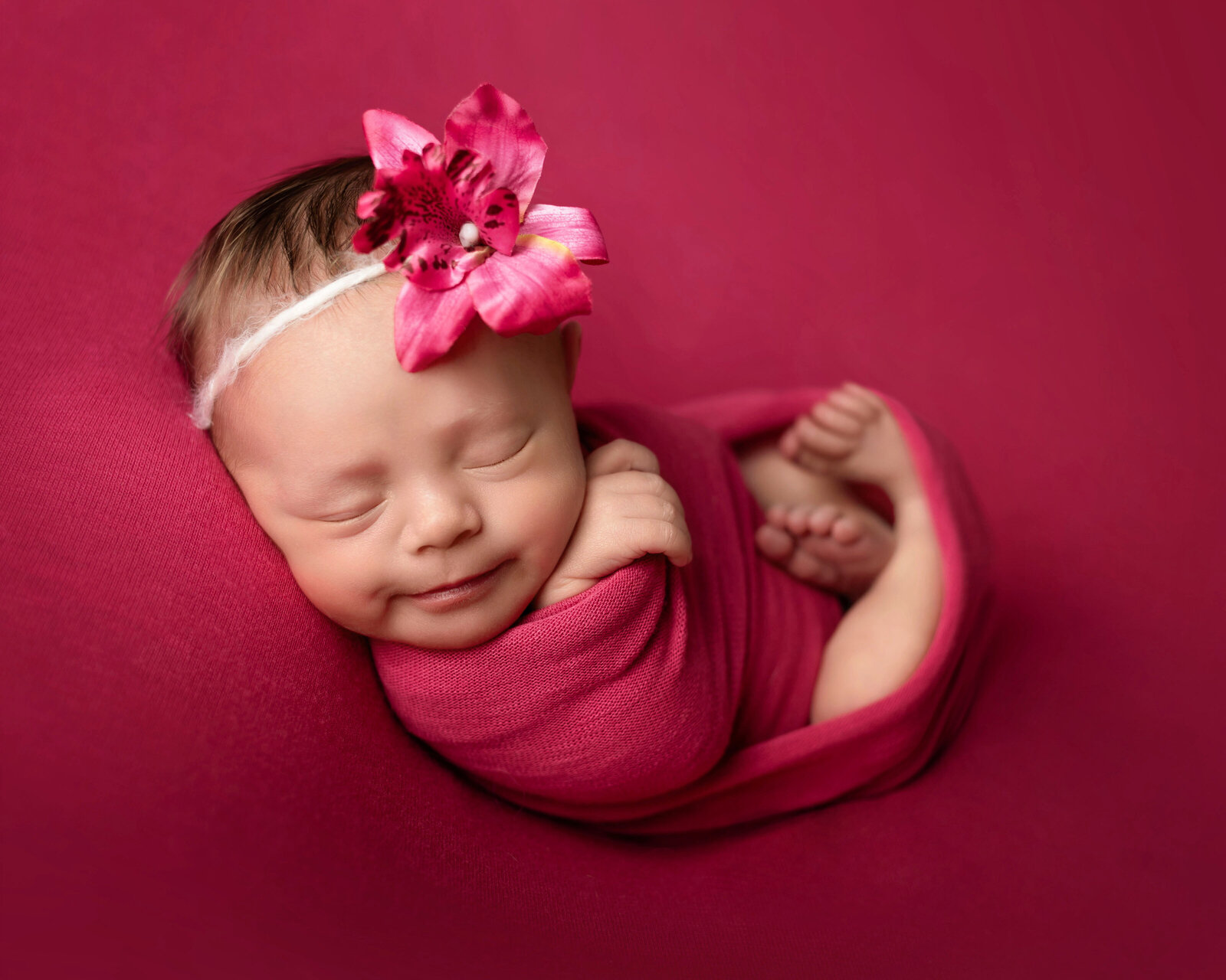 Hawaiian newborn lei photo headband pink posing utah