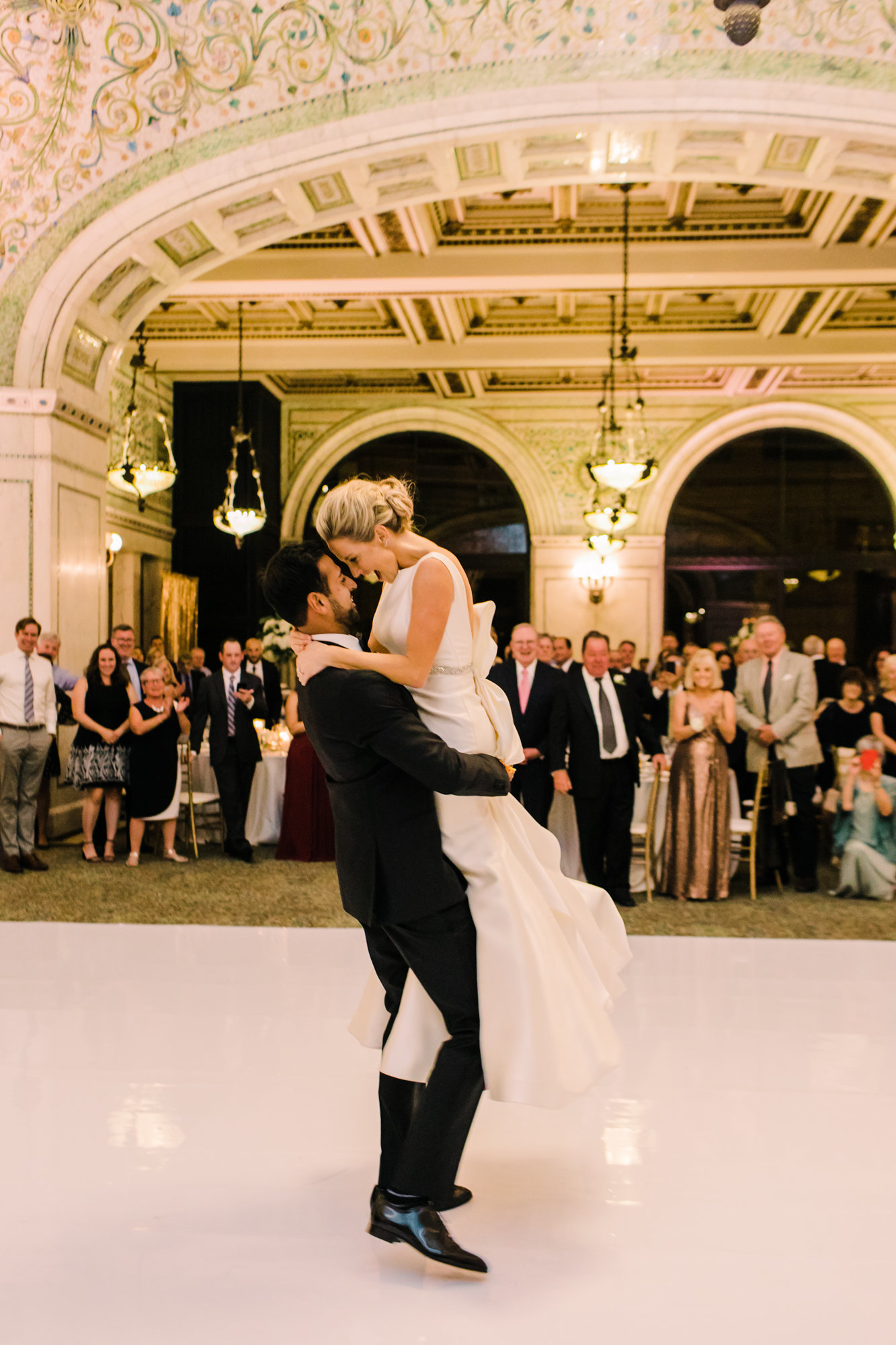 Bride and groom share their first dance inside the iconic Chicago Cultural Center