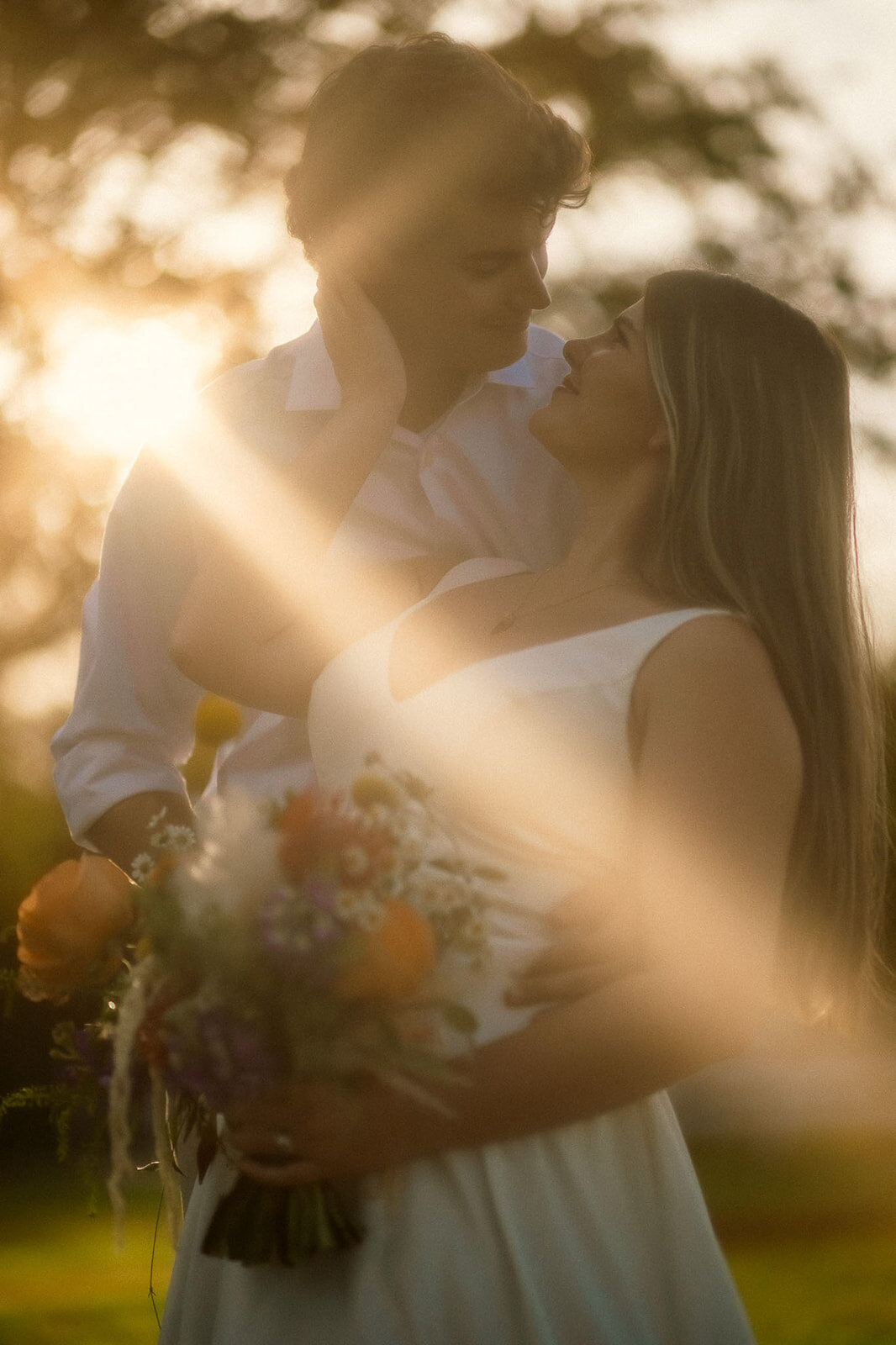 A serene couple basking in soft, golden morning light, preparing for her wedding day in San Antonio. Captured by CMH Studios in a luxury, editorial style.