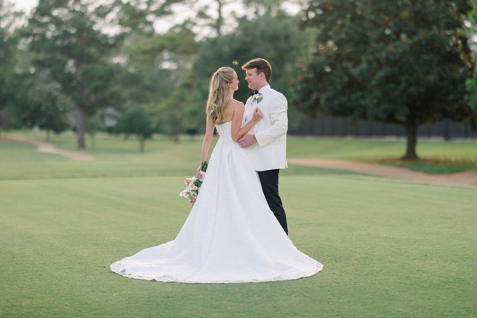 Bride and groom sunset portrait at a southern plantation country club wedding in Georgia