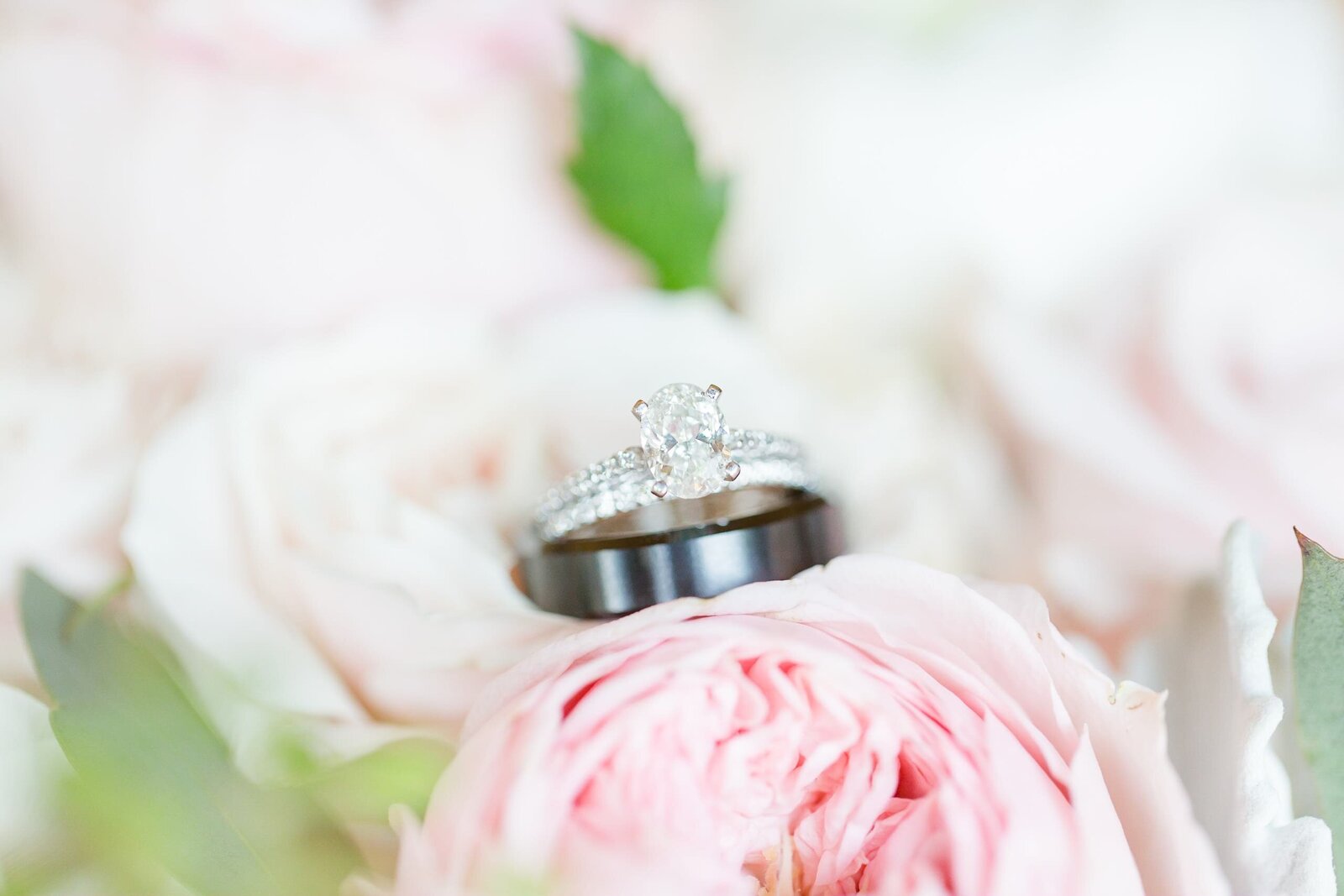 wedding-ring-on-pink-flower