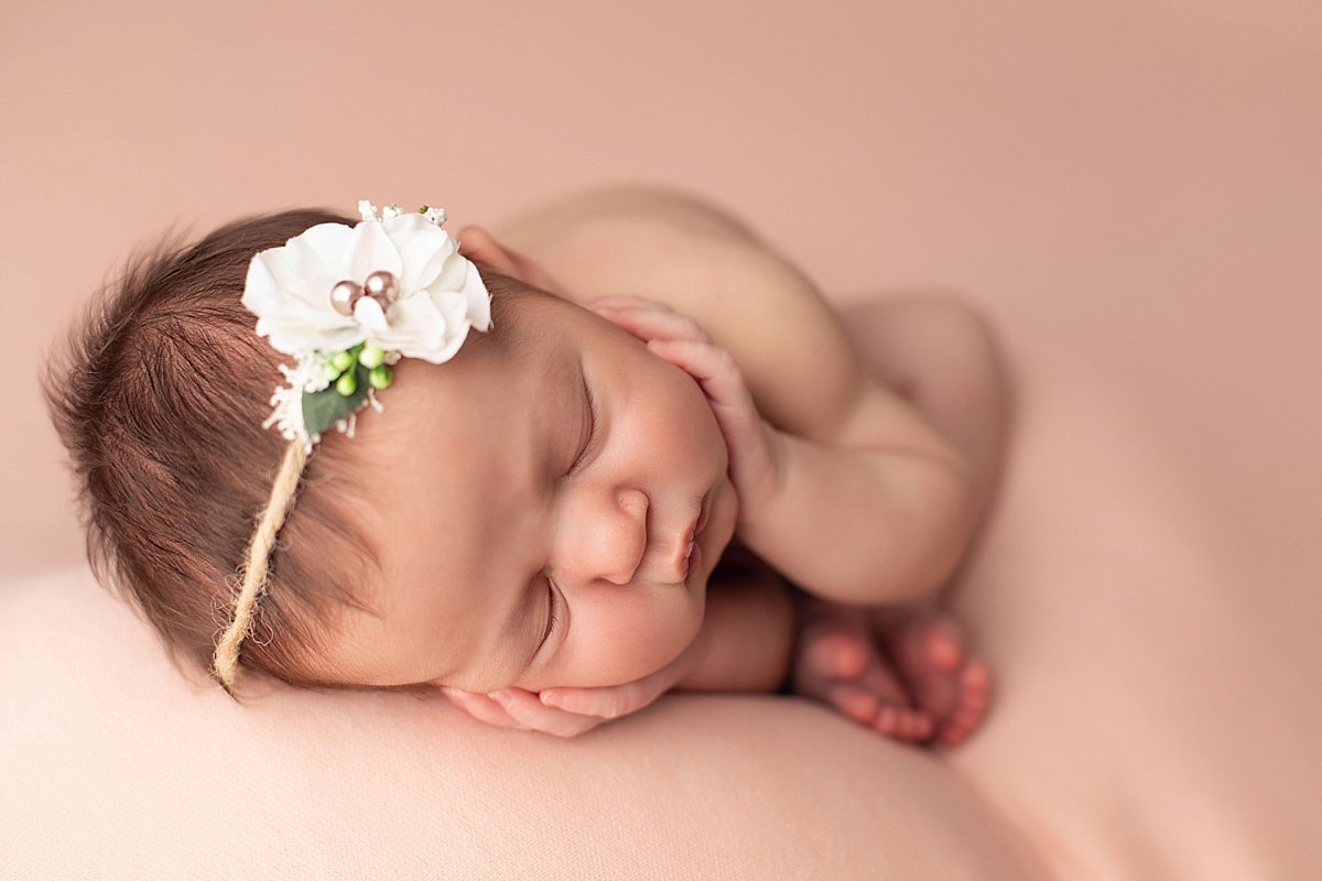 newborn-on-pink-fabric-decatur
