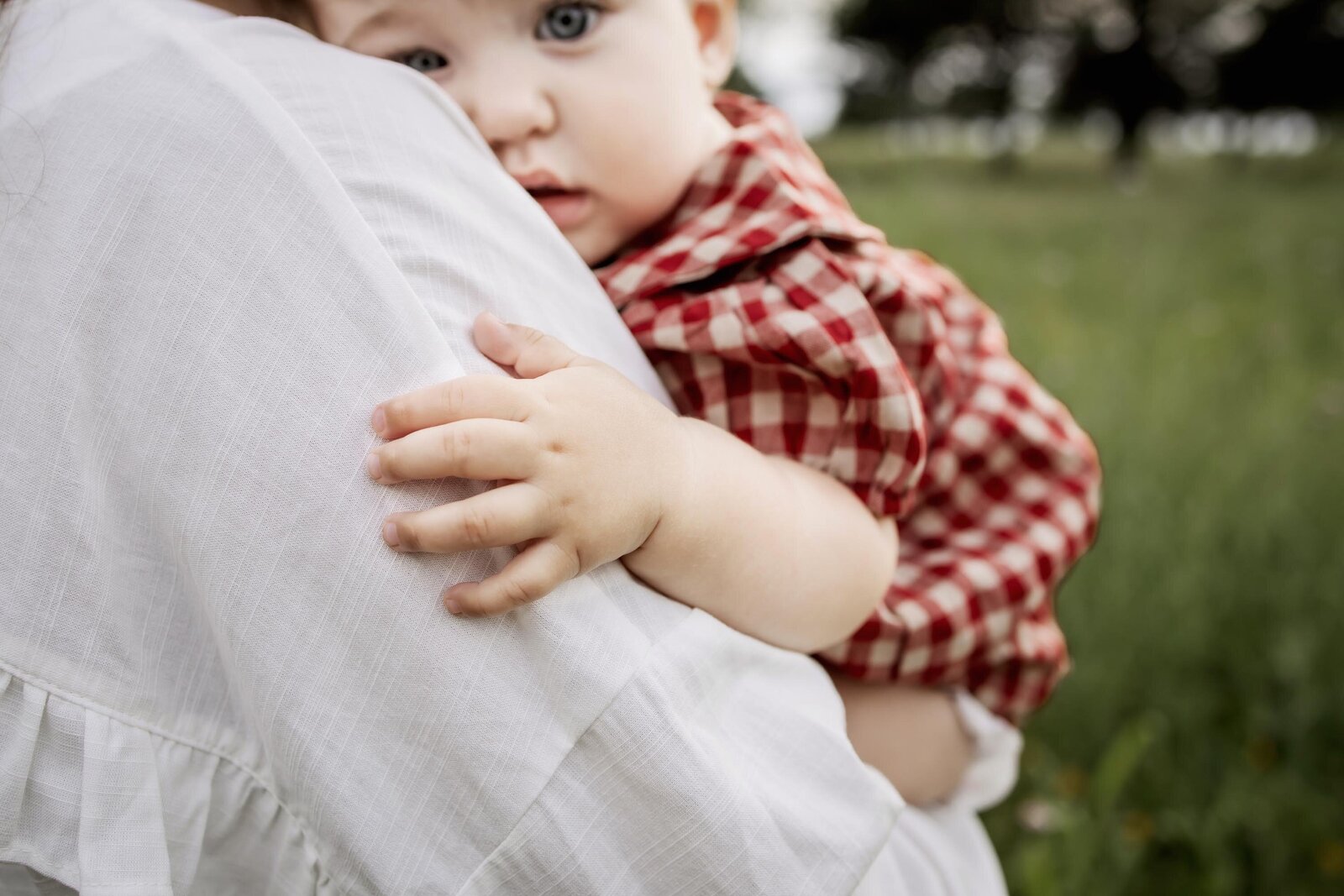 mom holds sleepy baby at the end of the day in Anna Texas