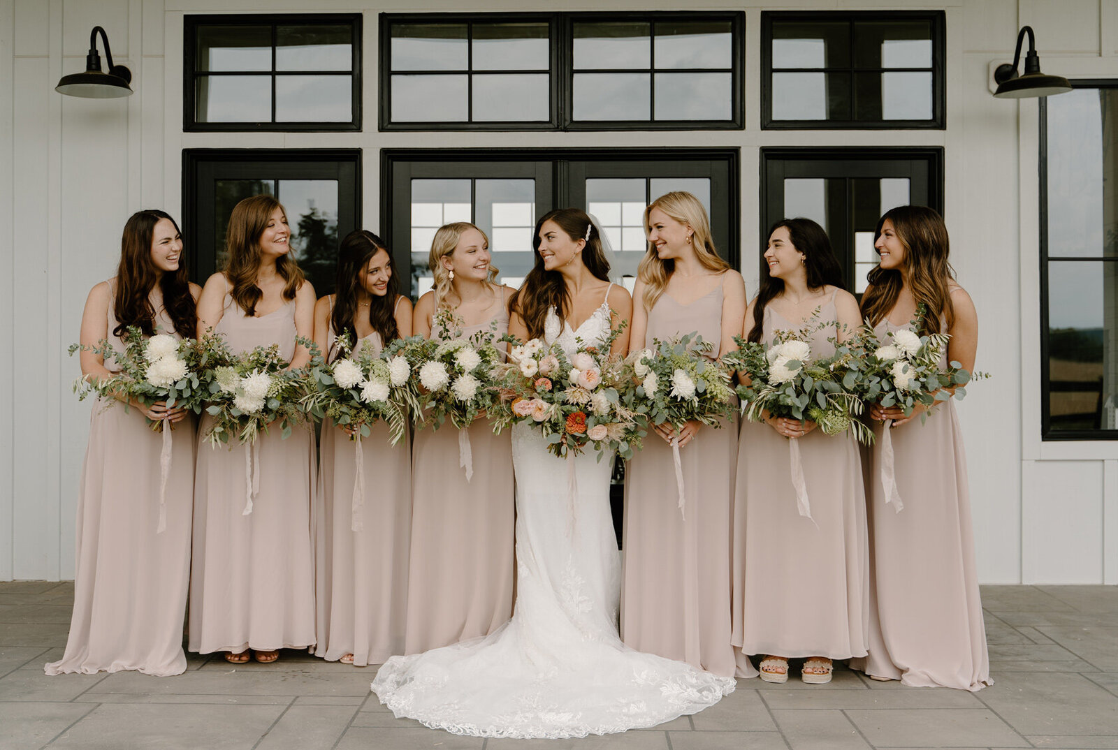 Photo of bridesmaids in a blush colored dresses at a dreamy Virginia Wedding