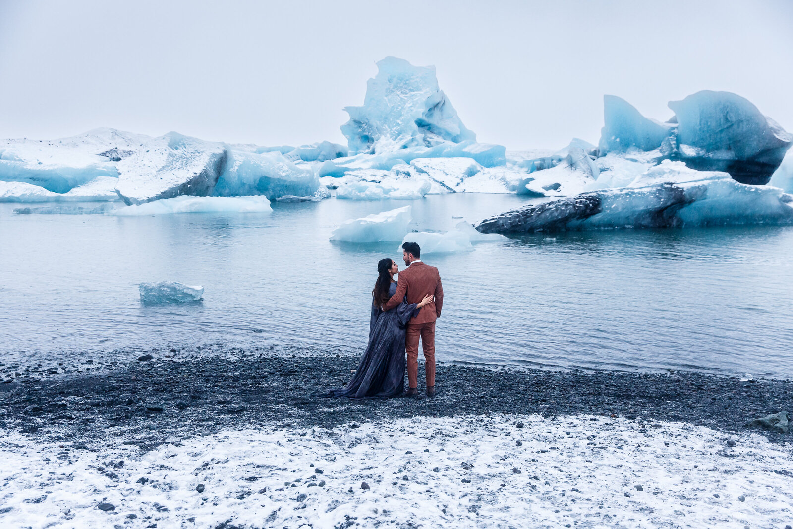 This couple eloped in front of massive glacier pieces in Iceland.