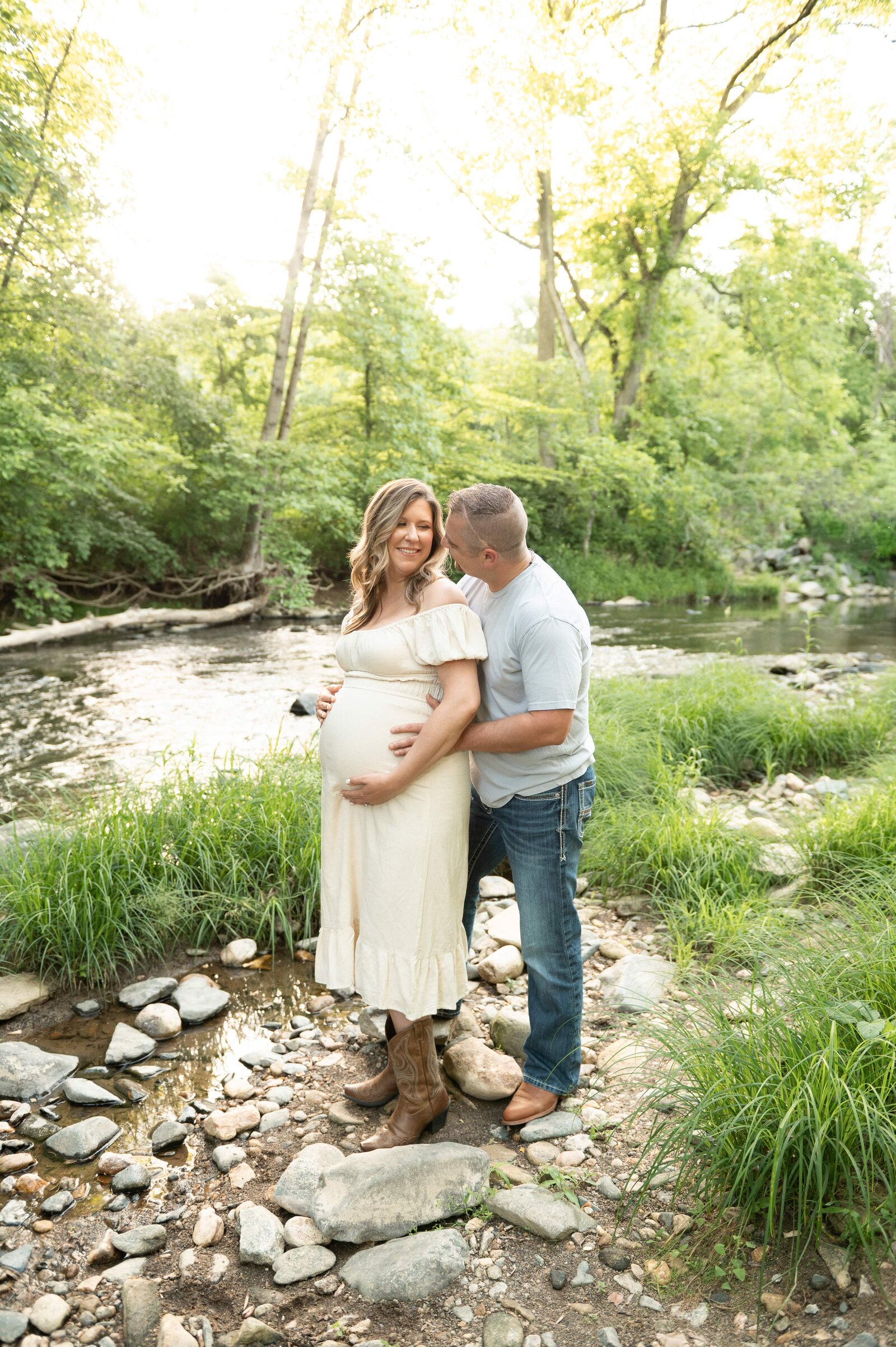 husband and wife by a stream at jerusalem mills