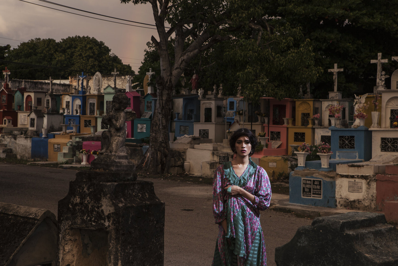 Makeup on model standing in cemetery