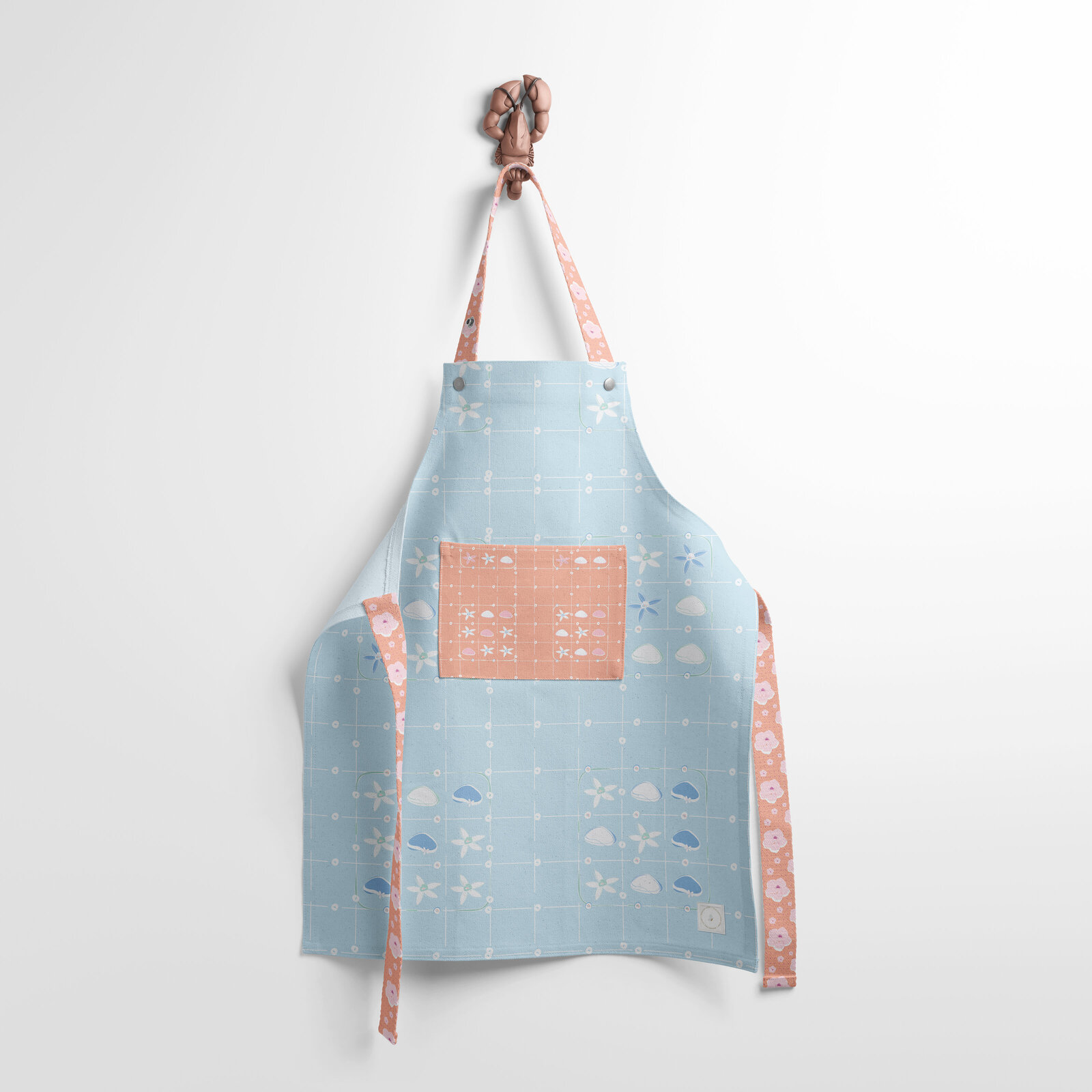 blue, white, and coral patterned apron