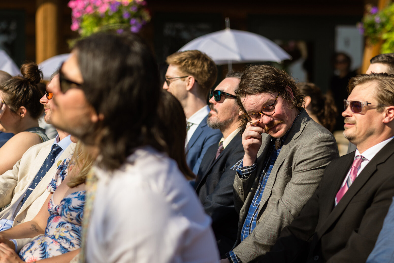 A guest shedding a tear on their wedding day