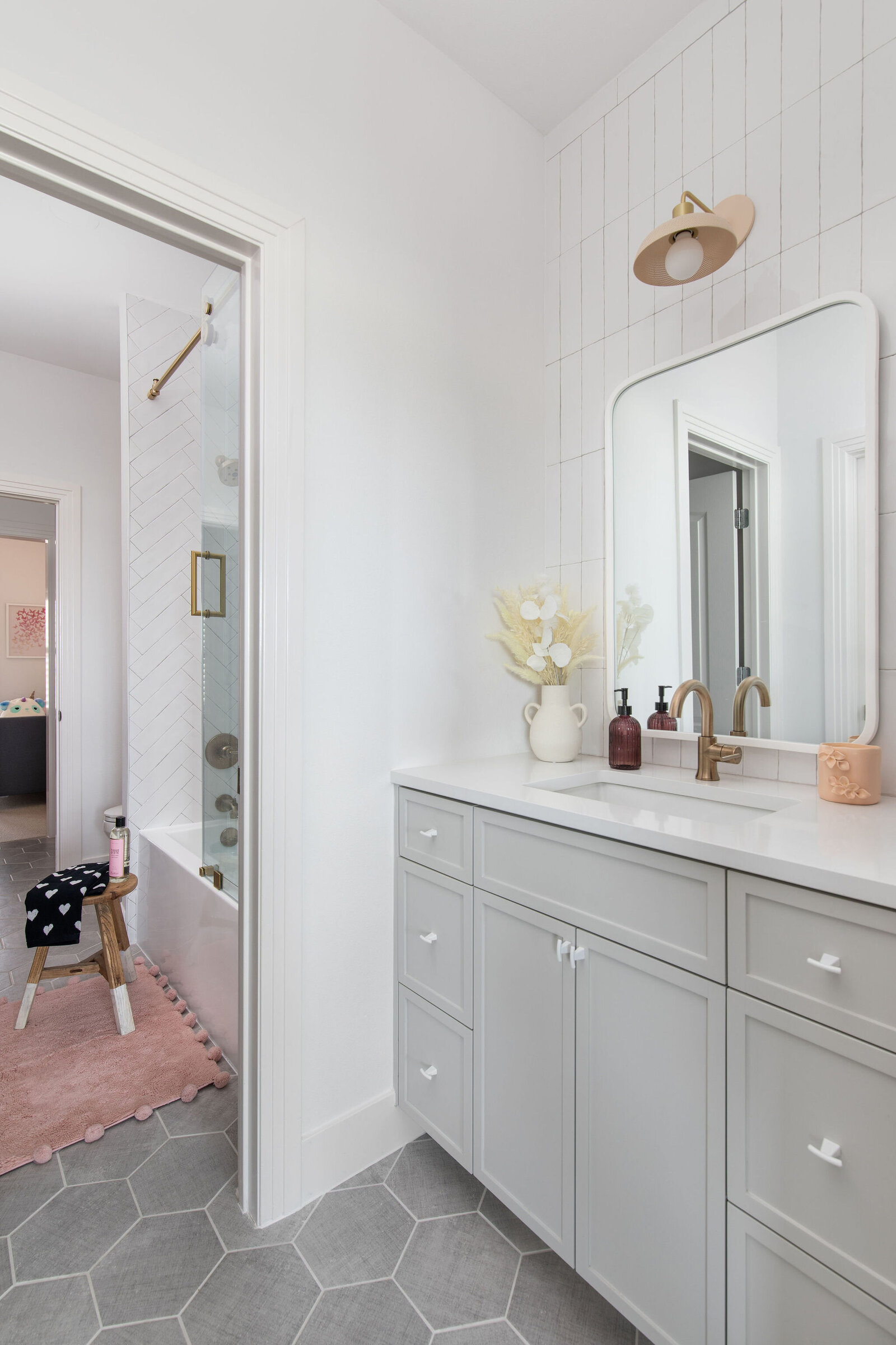 Gray+vanity+girls+bathroom+design+remodel+hexagon+tile+pink+nuela+designs