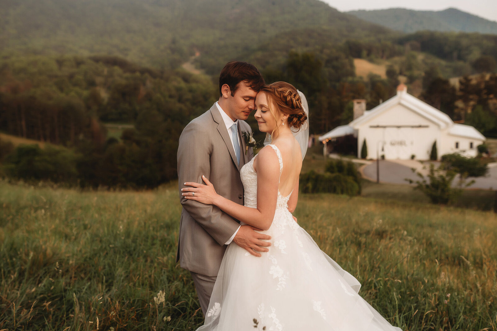 Newlyweds pose for Wedding Photos at Chestnut Ridge Events in Asheville, NC.