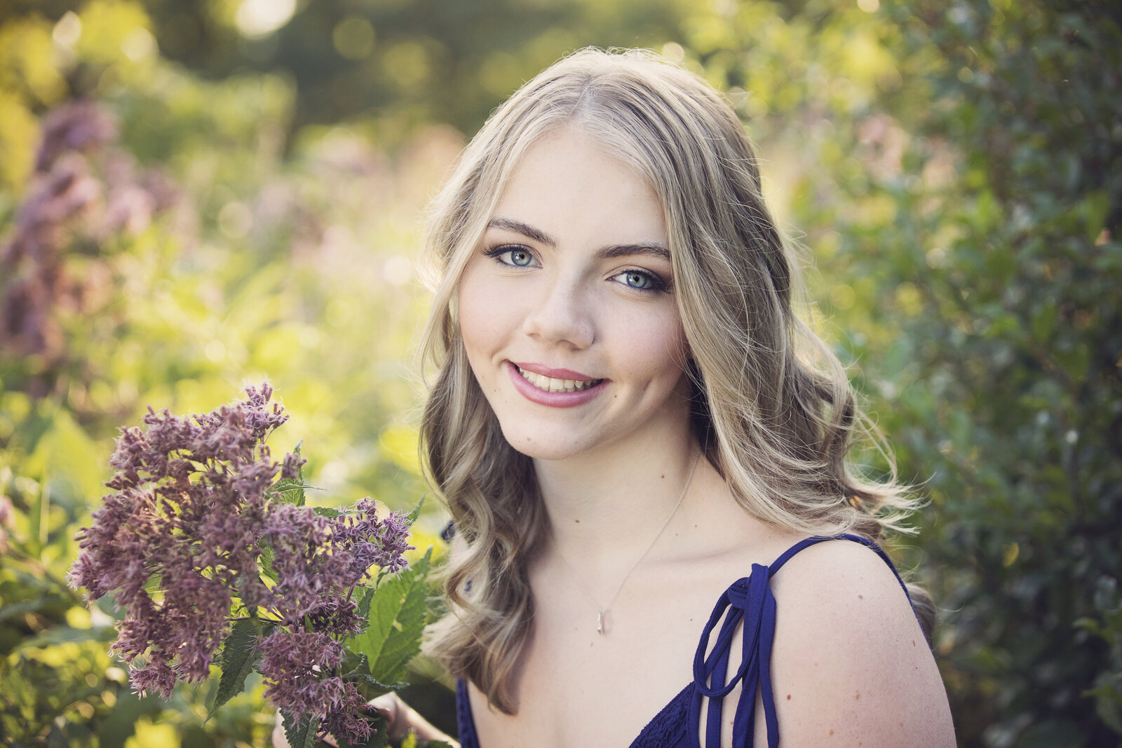 Senior girl in purple field