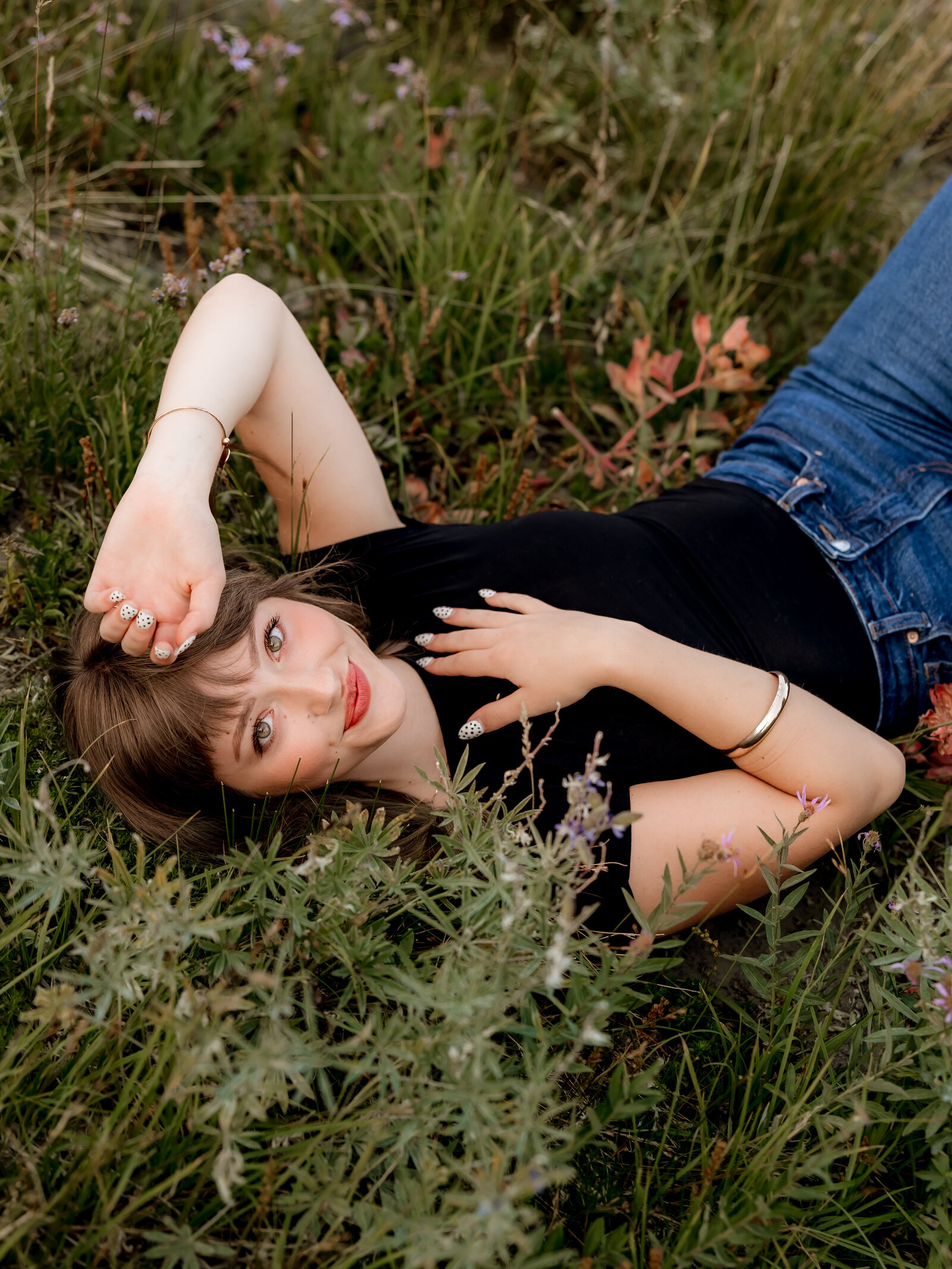 Sandy High School senior doing senior portraits at sunset at Timberline Lodge.