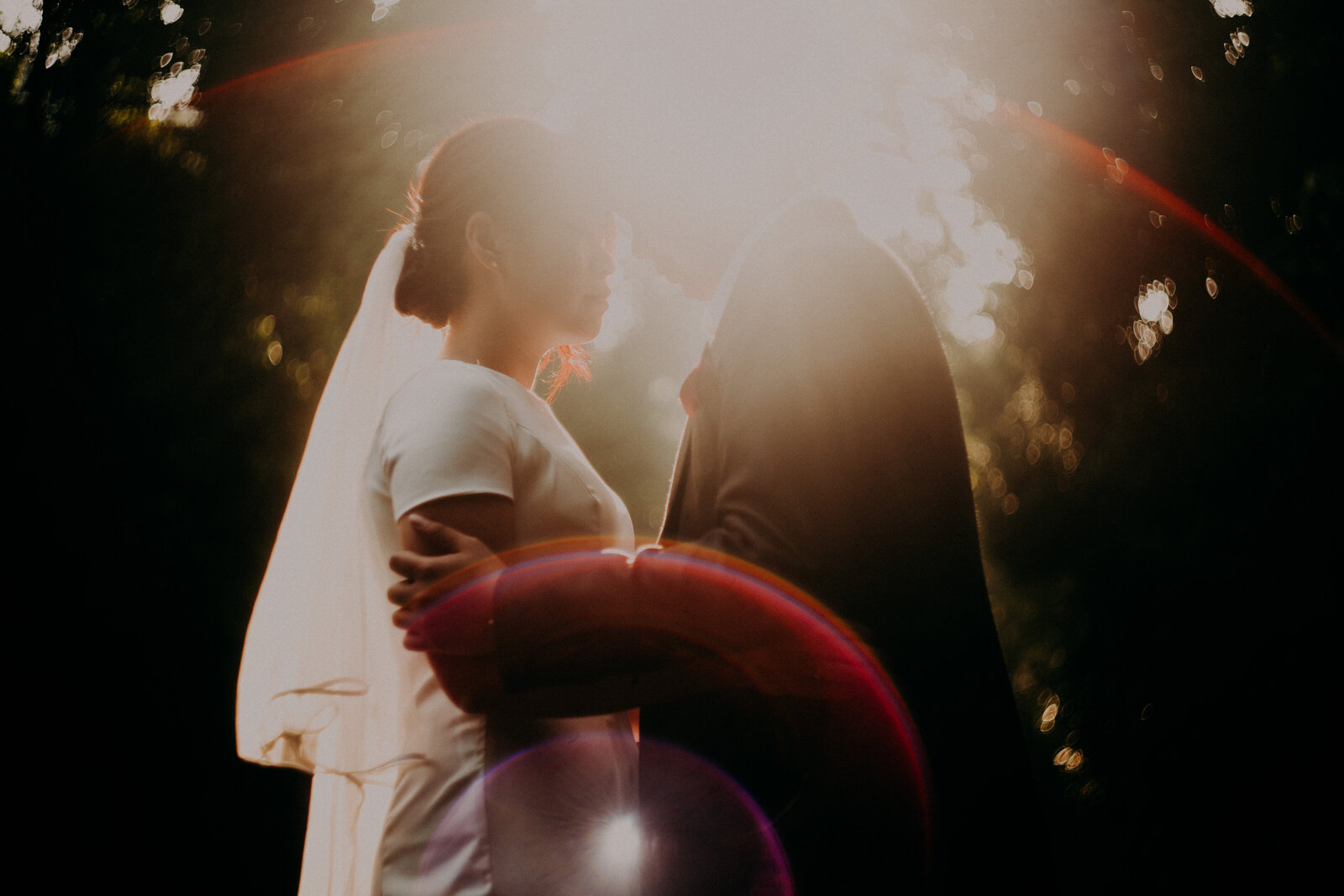 couple and the sun flare